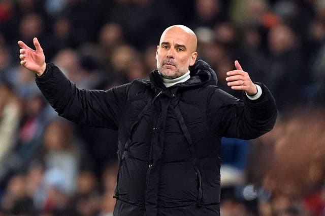 A cut was visible on Pep Guardiola’s nose during their match against Feyenoord (Martin Rickett/PA)