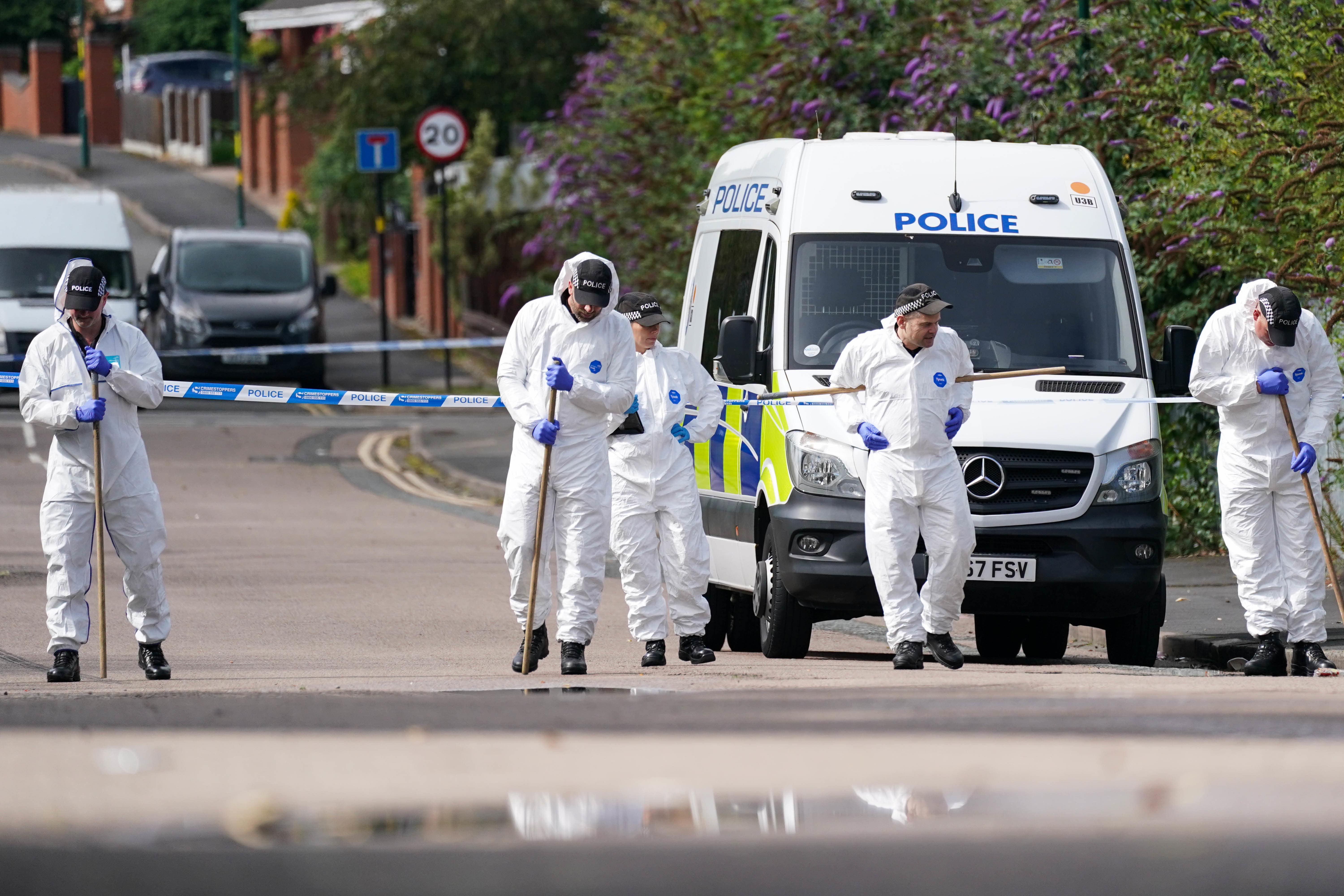 Forensic officers at the scene on Freeth Street in Ladywood, Birmingham (Jacob King/PA)