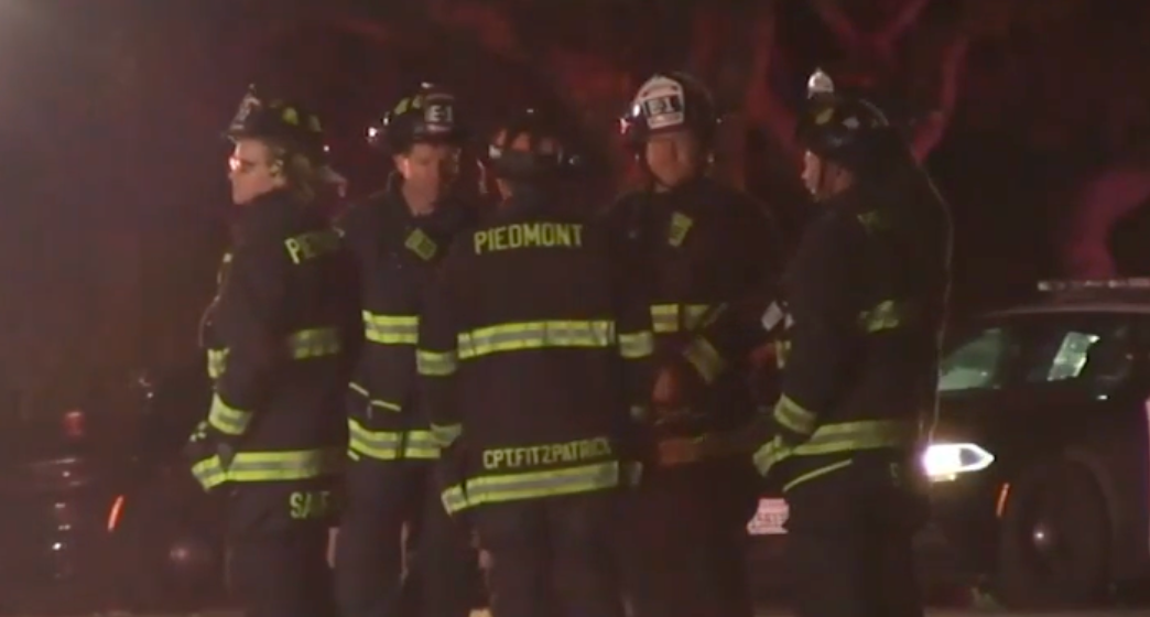 Members of the Piedmont Fire Department responding to the Cybertruck crash early Wednesday morning