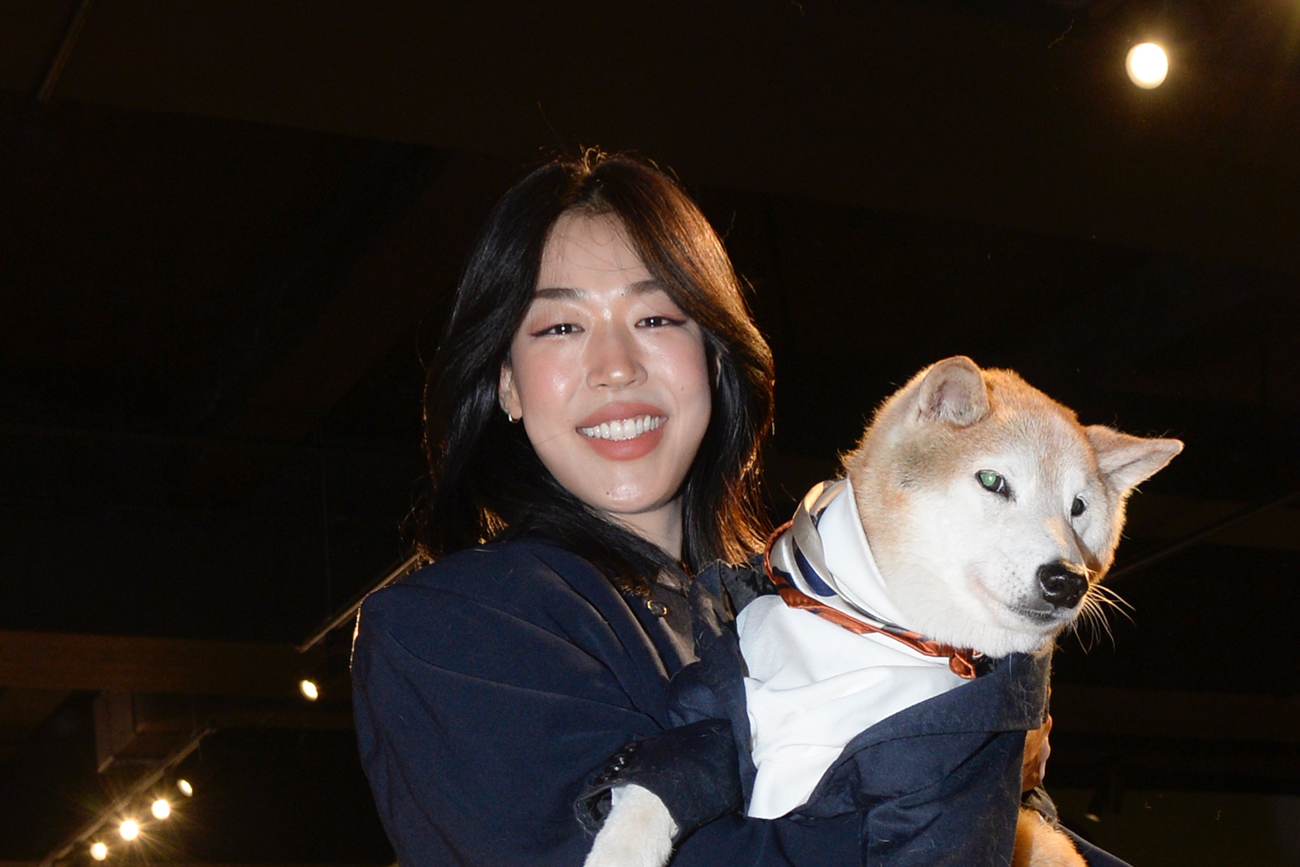 Menswear Dog and his owner Yena Kim attend the Lost Pattern show during New York Fashion Week on September 11, 2024