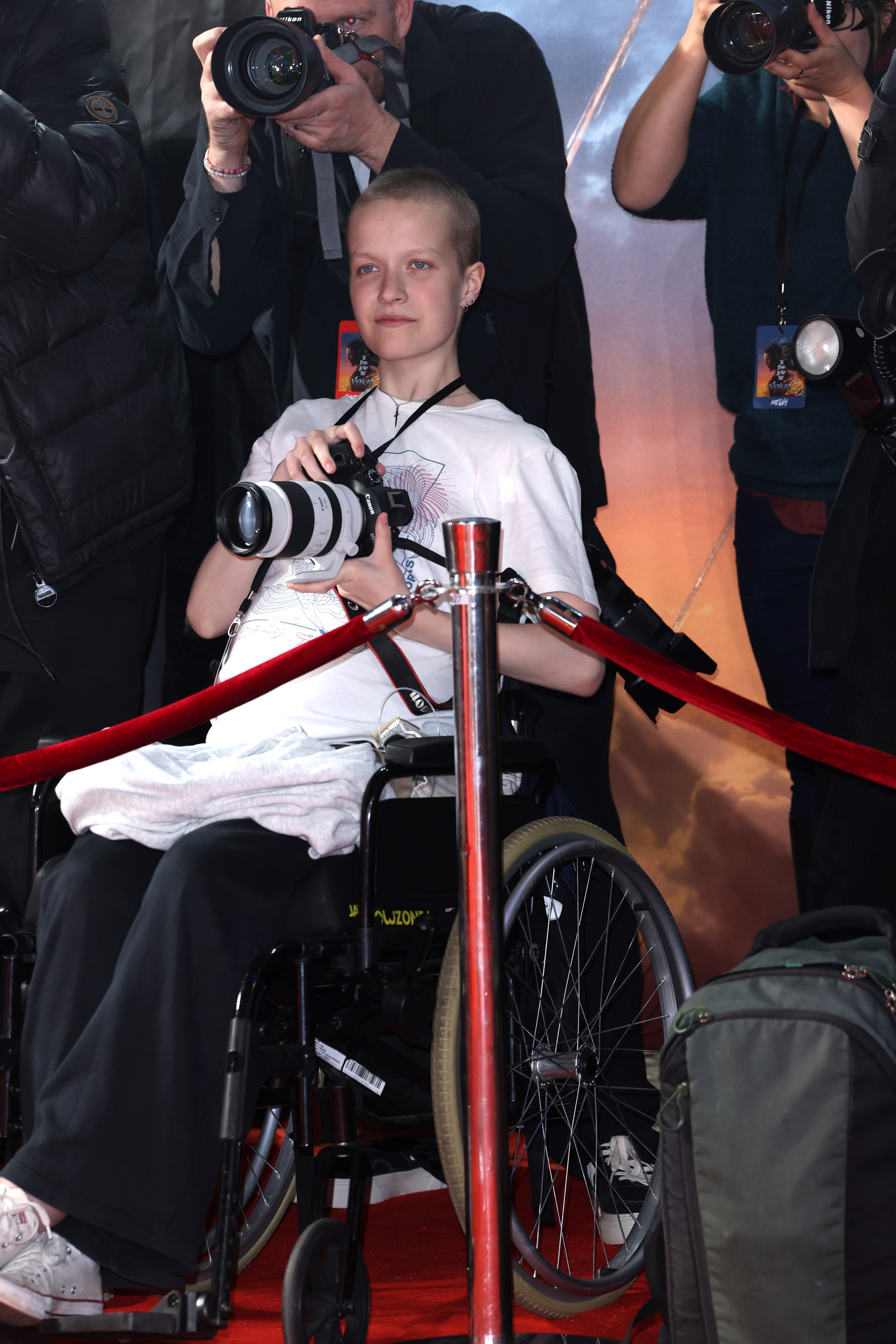 Liz Hatton alongside press photographers during the UK premiere of Venom: The Last Dance