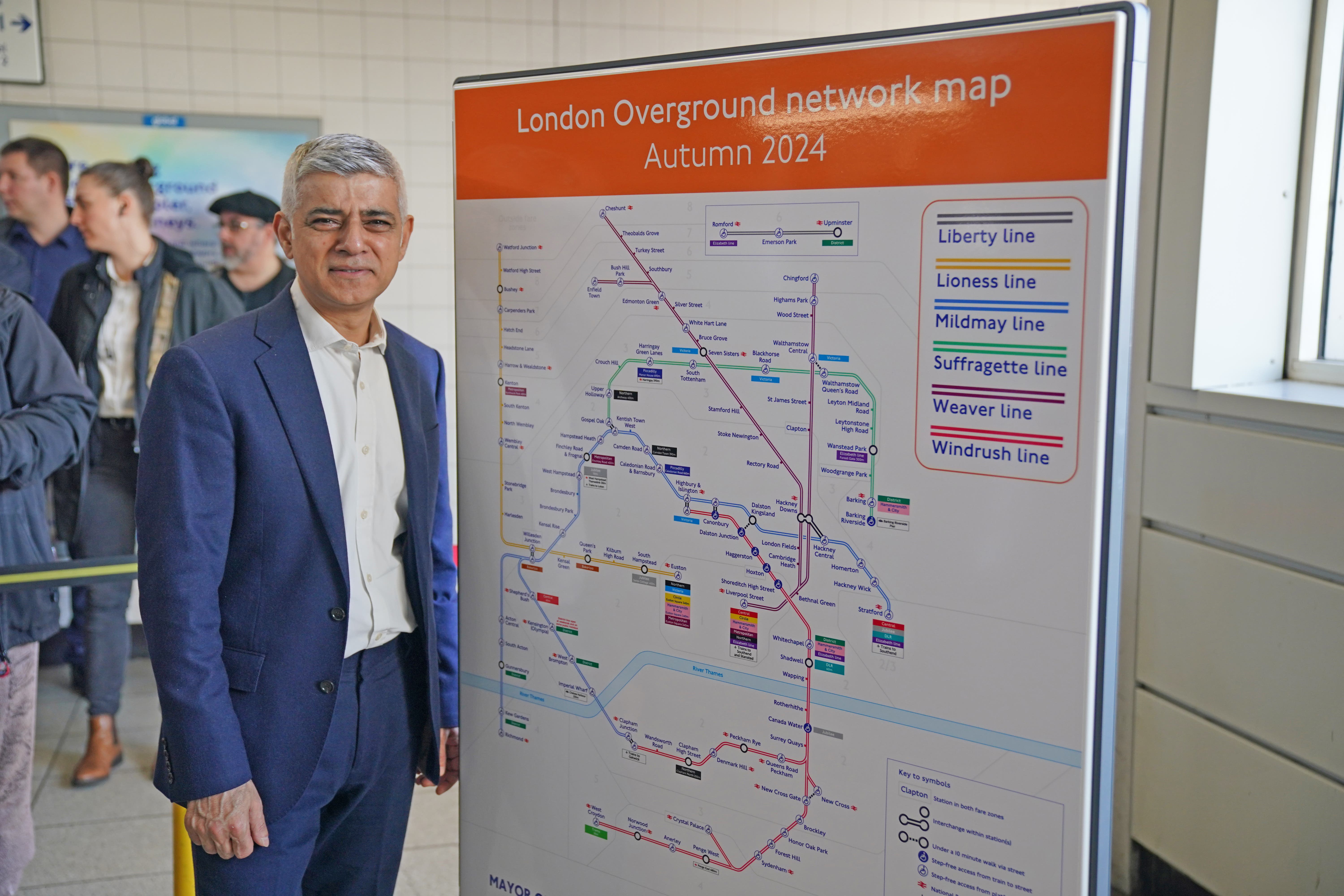 Mayor of London Sadiq Khan launches the new names and colours of the London Overground (Jonathan Brady/PA)