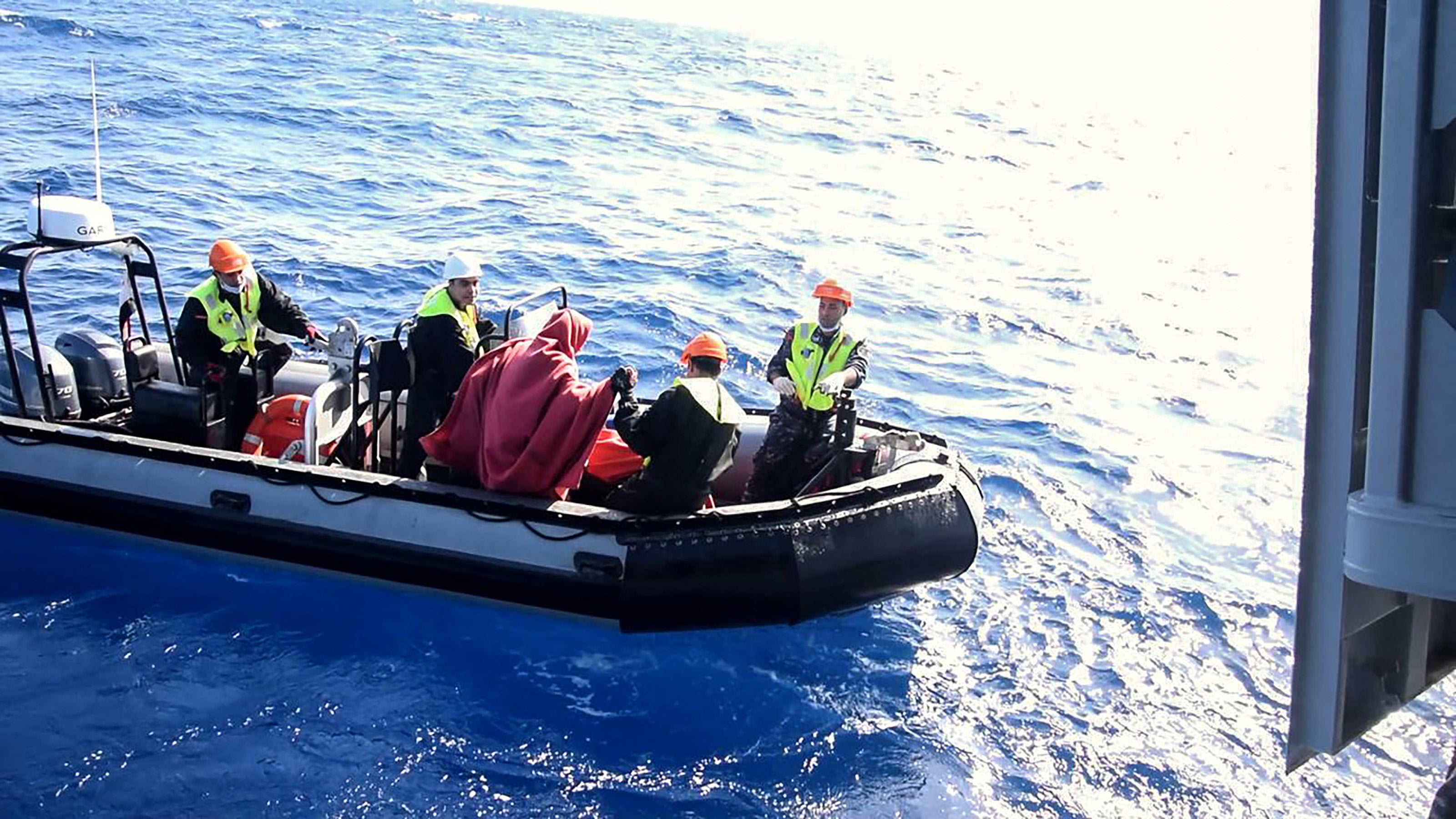 New pictures of the rescue released by the Egyptian military show survivors being brought to safety