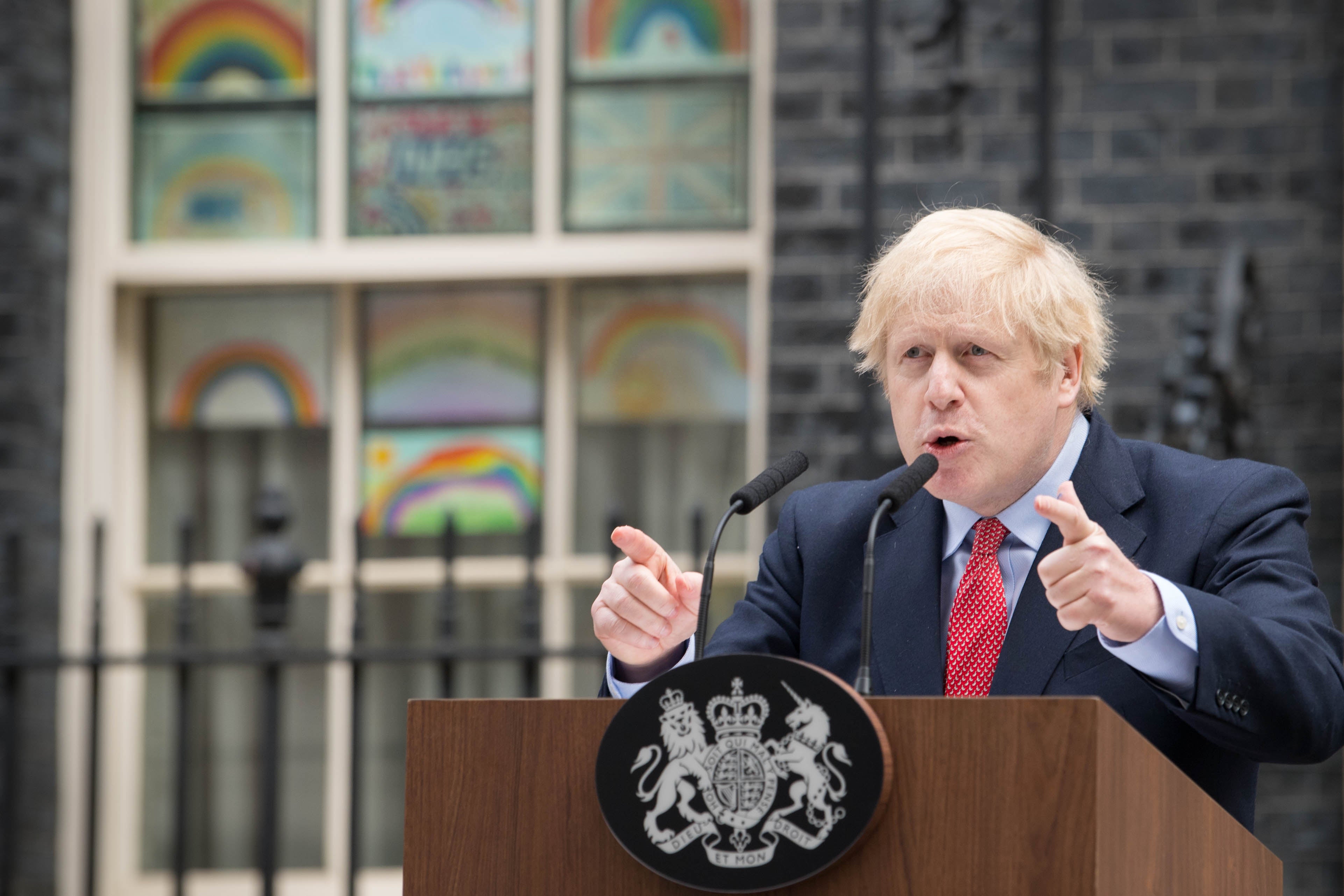 Prime Minister Boris Johnson makes a statement outside 10 Downing Street in April 2020. (Stefan Rousseau/PA)