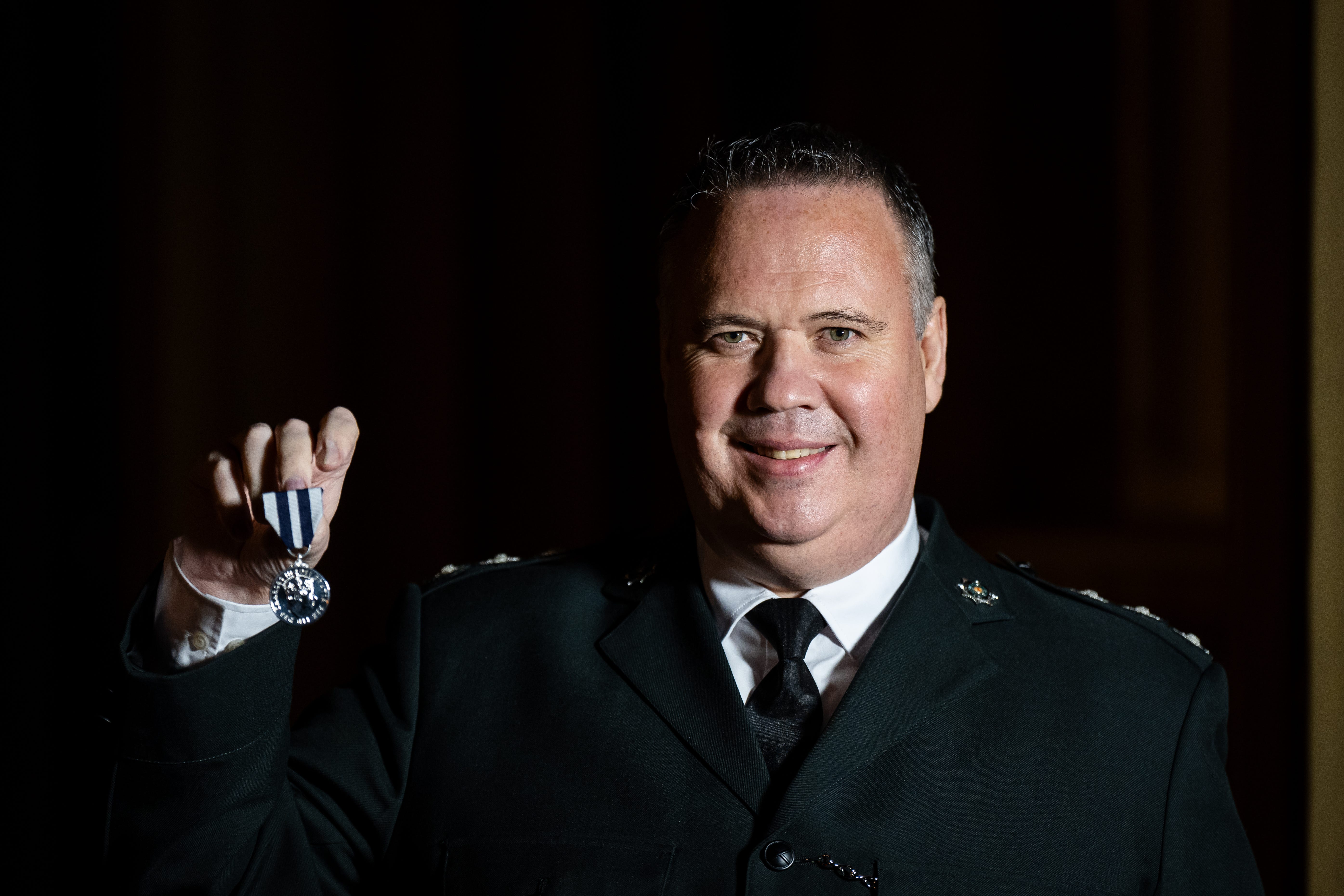 John Caldwell, Detective Chief Inspector, Police Service of Northern Ireland (PSNI) after being decorated with the King’s Police Medal (Aaron Chown/PA)