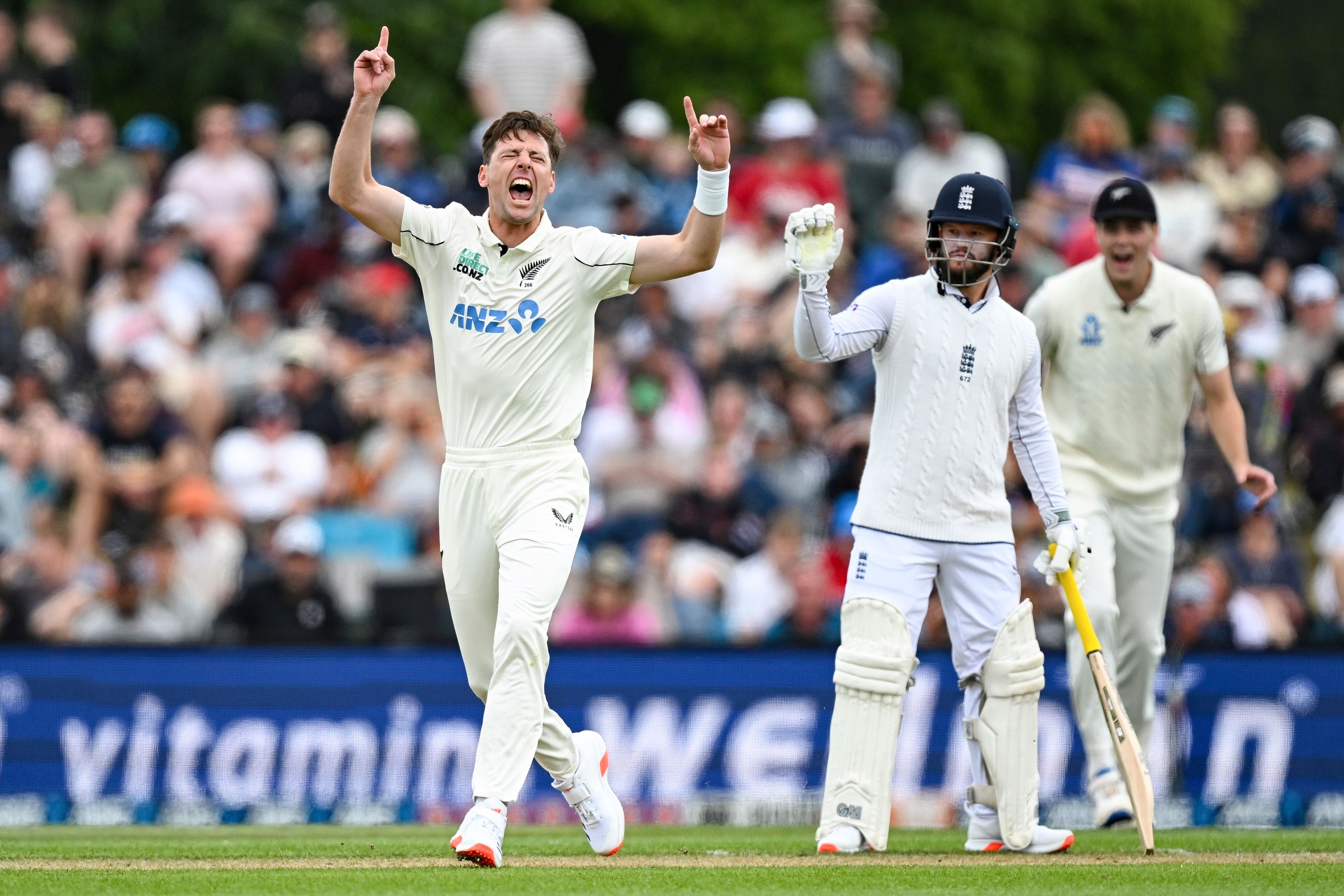 New Zealand’s Matt Henry celebrates after taking the wicket of England’s Zak Crawley (Andrew Cornaga/Photosport/AP)