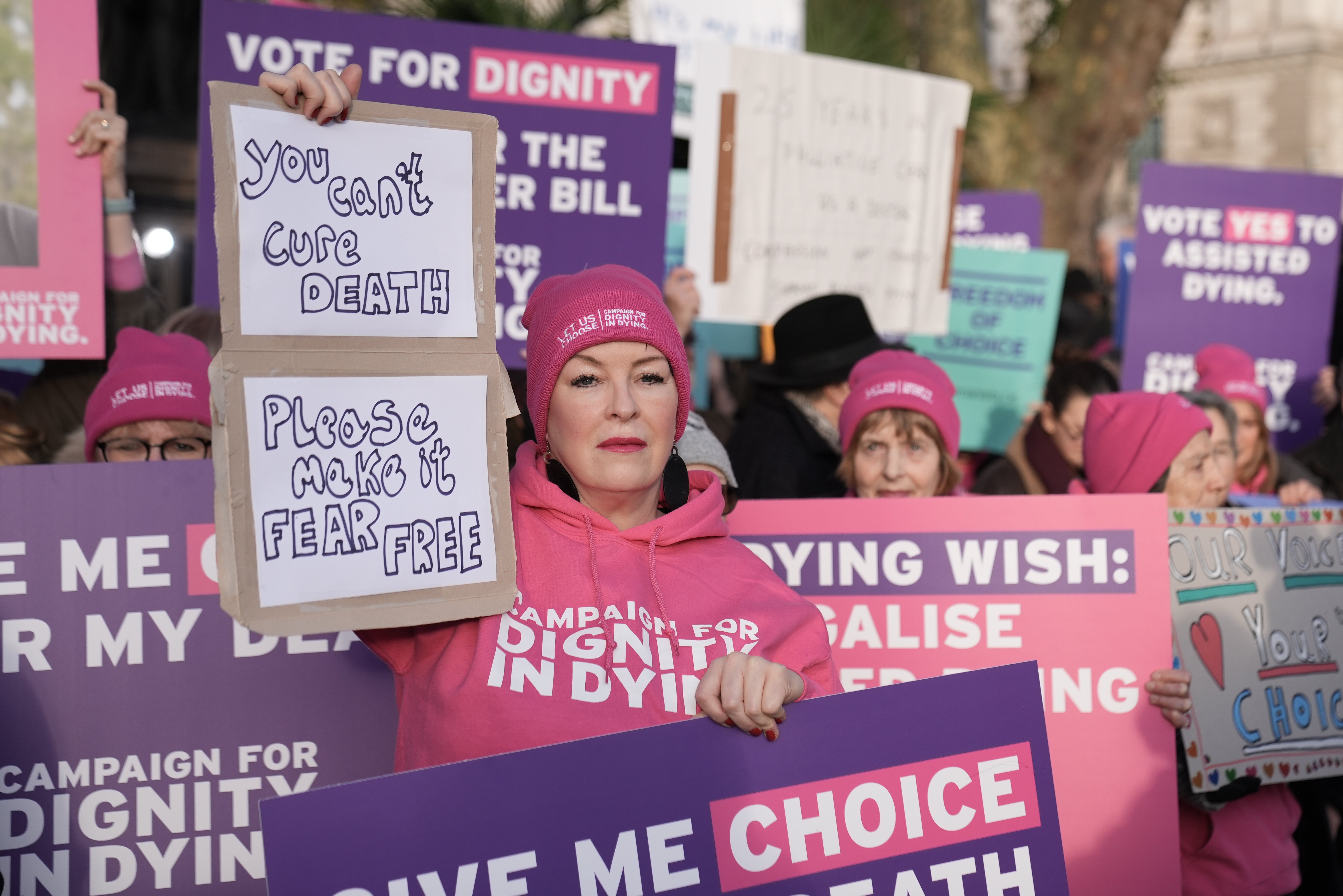 People took part in a demonstration organised by Dignity in Dying outside parliament as MPs debated the assisted dying bill