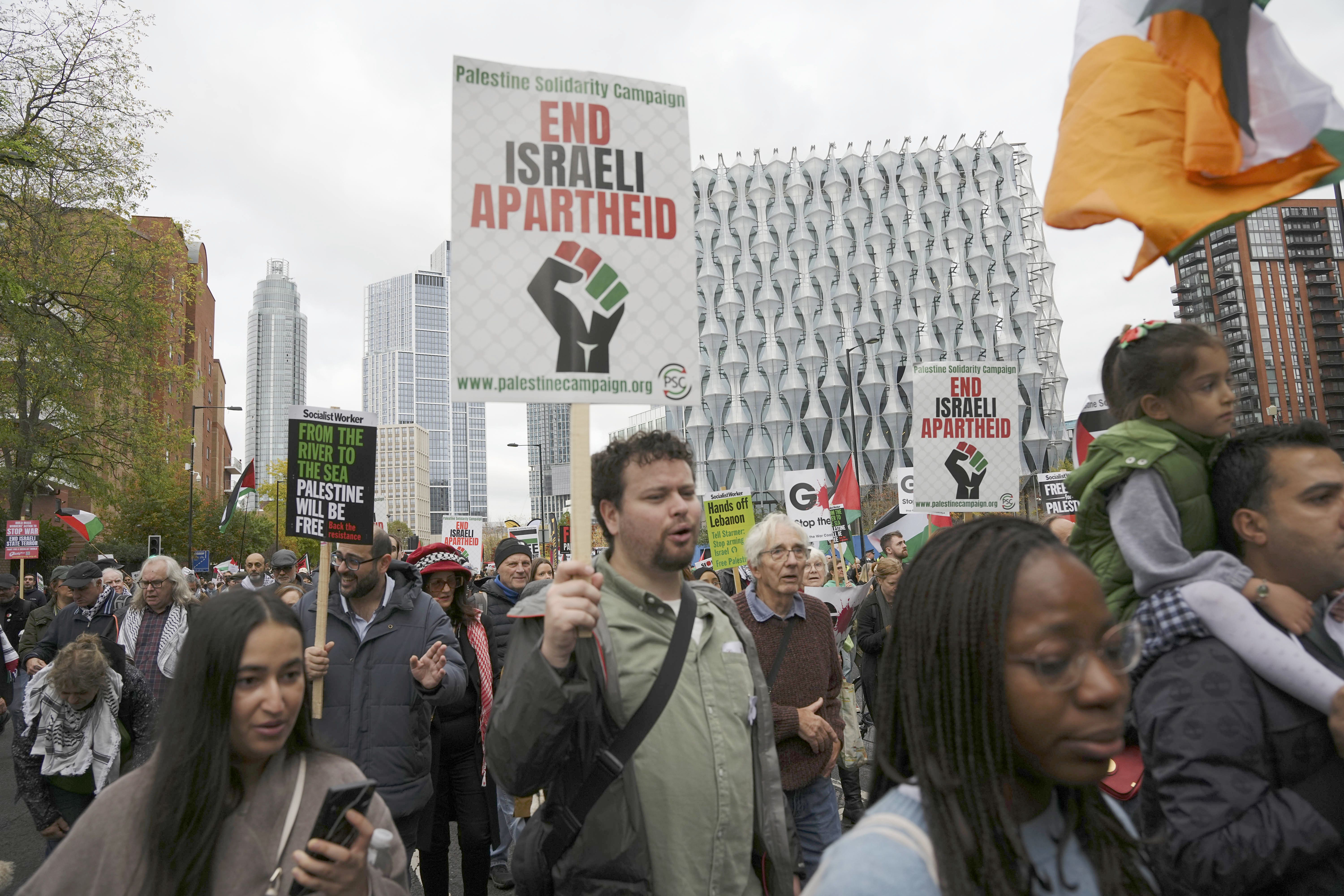 People take part in a Palestine Solidarity Campaign rally in central London (PA)