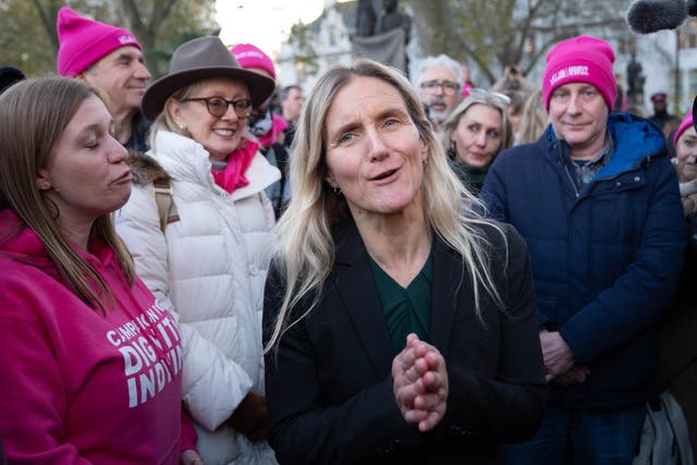 <p>Kim Leadbeater joins supporters in Parliament Square in London after hearing the result of the vote in parliament </p>