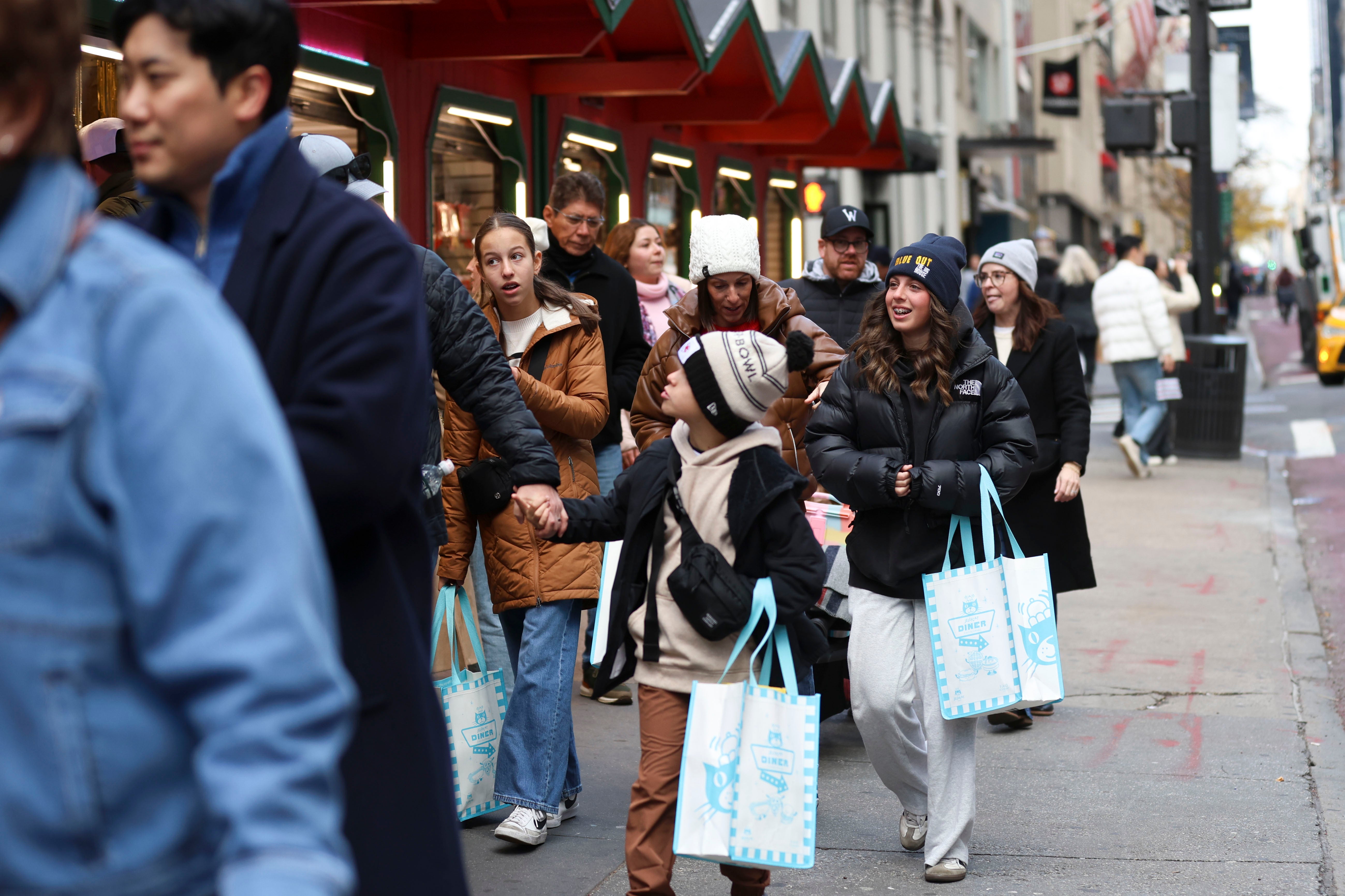 Sales soared this holiday weekend for U.S. shoppers, with a record-setting $6.4 billion spent on Thanksgiving alone