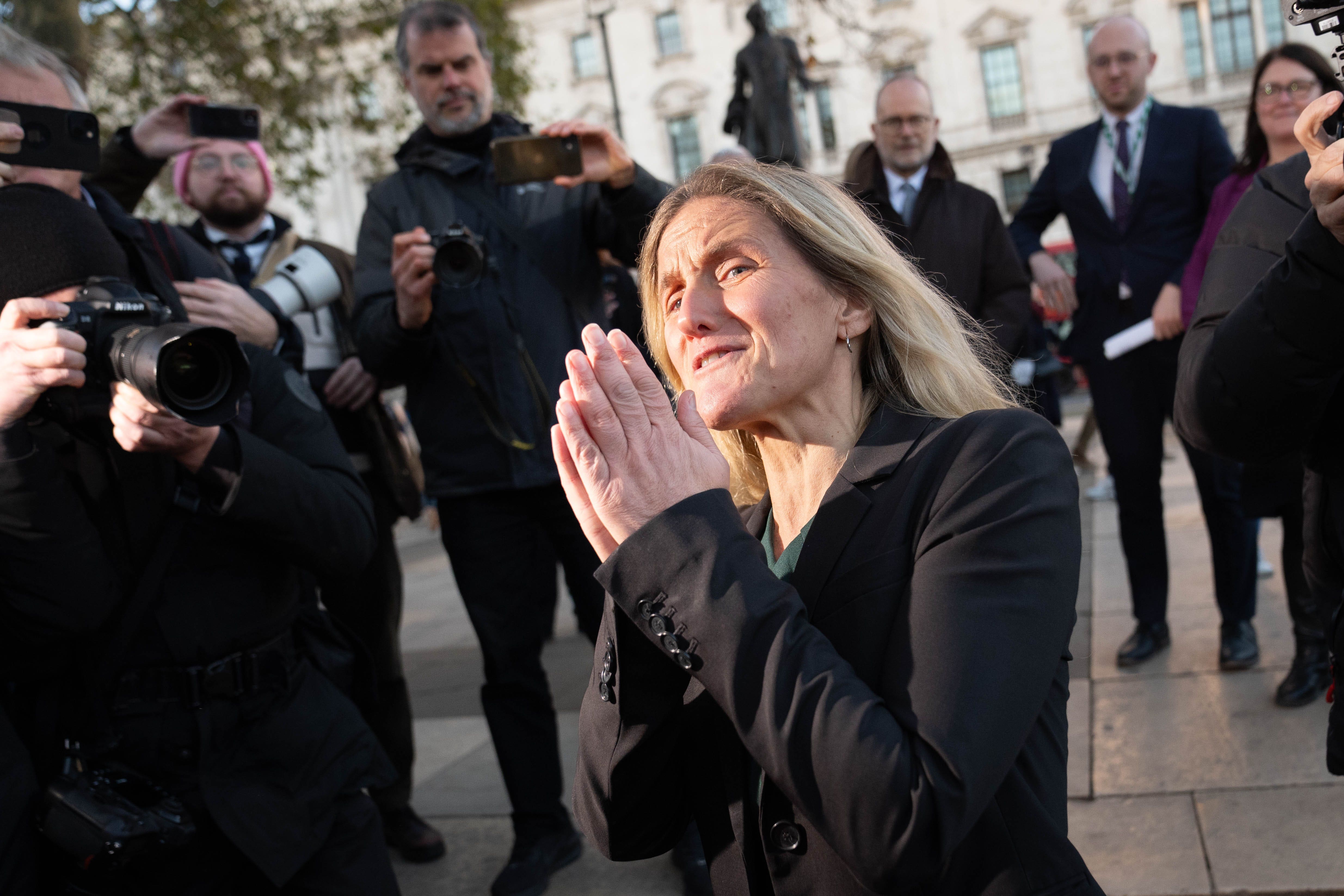 Kim Leadbeater joins supporters in Parliament Square in London after hearing the result of the vote in parliament for her Terminally Ill Adults (End of Life) Bill. Picture date: Friday November 29, 2024.