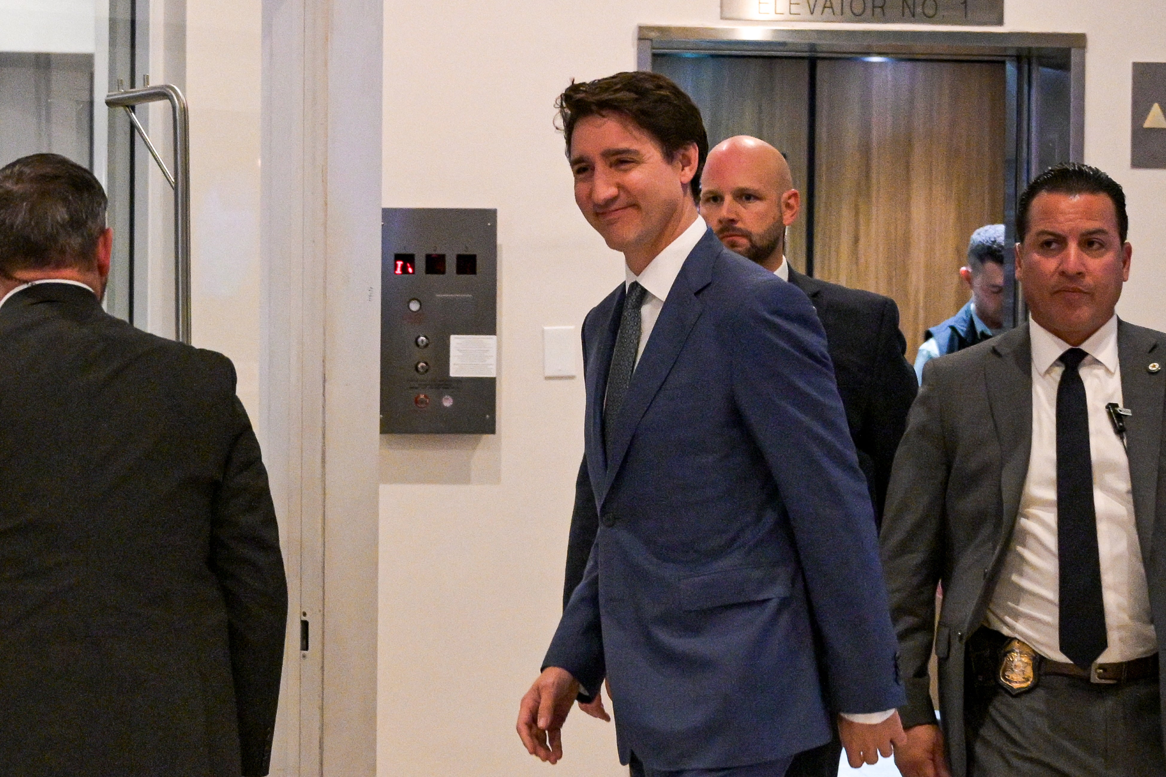 Canadian Prime Minister Justin Treadeau leaves his hotel as he heads to meet US President-elect Donald Trump, in West Palm Beach, Florida