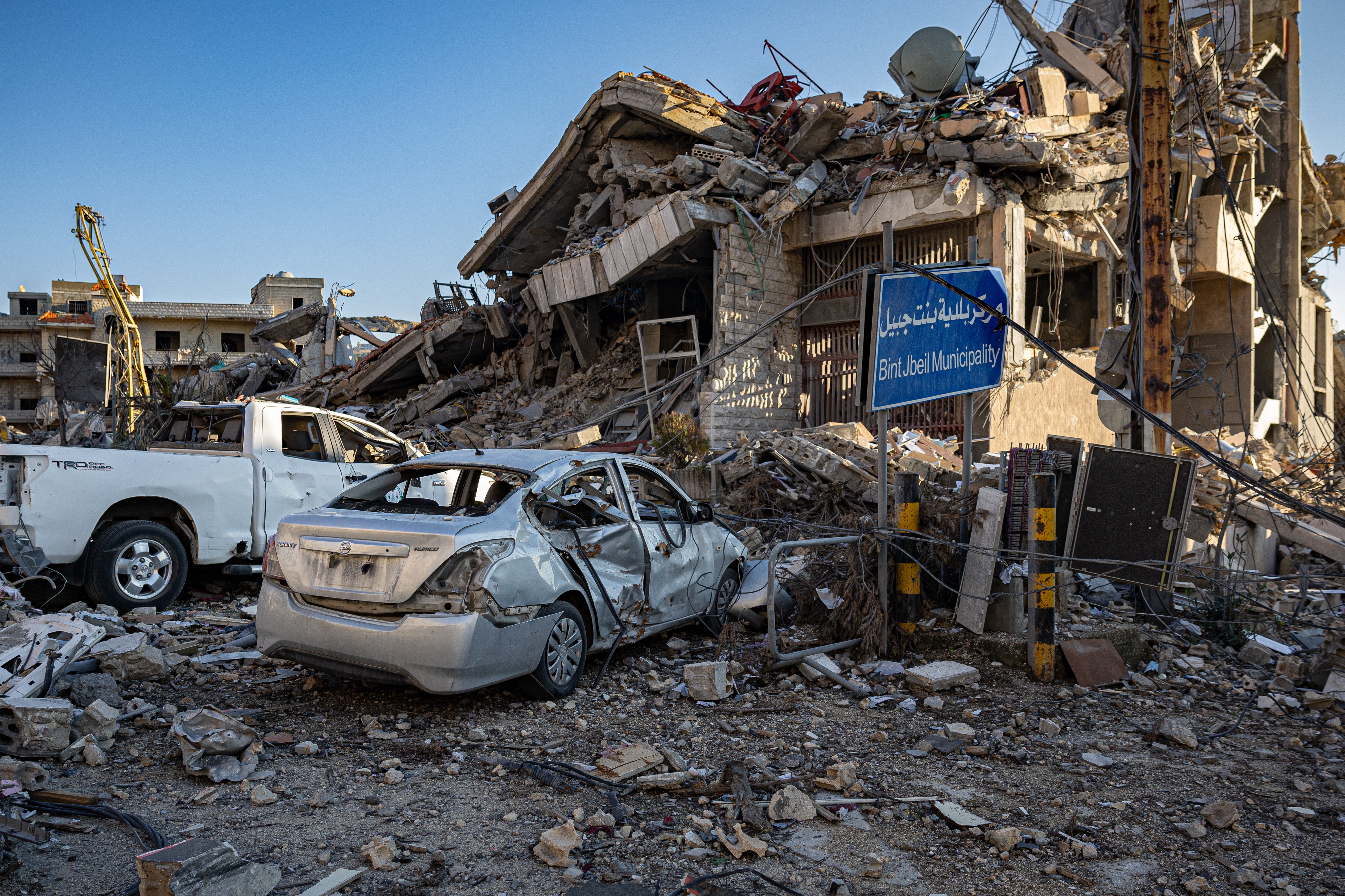 The destroyed central souk of Beit Jbeil, where gunfire still rings in the background despite a truce