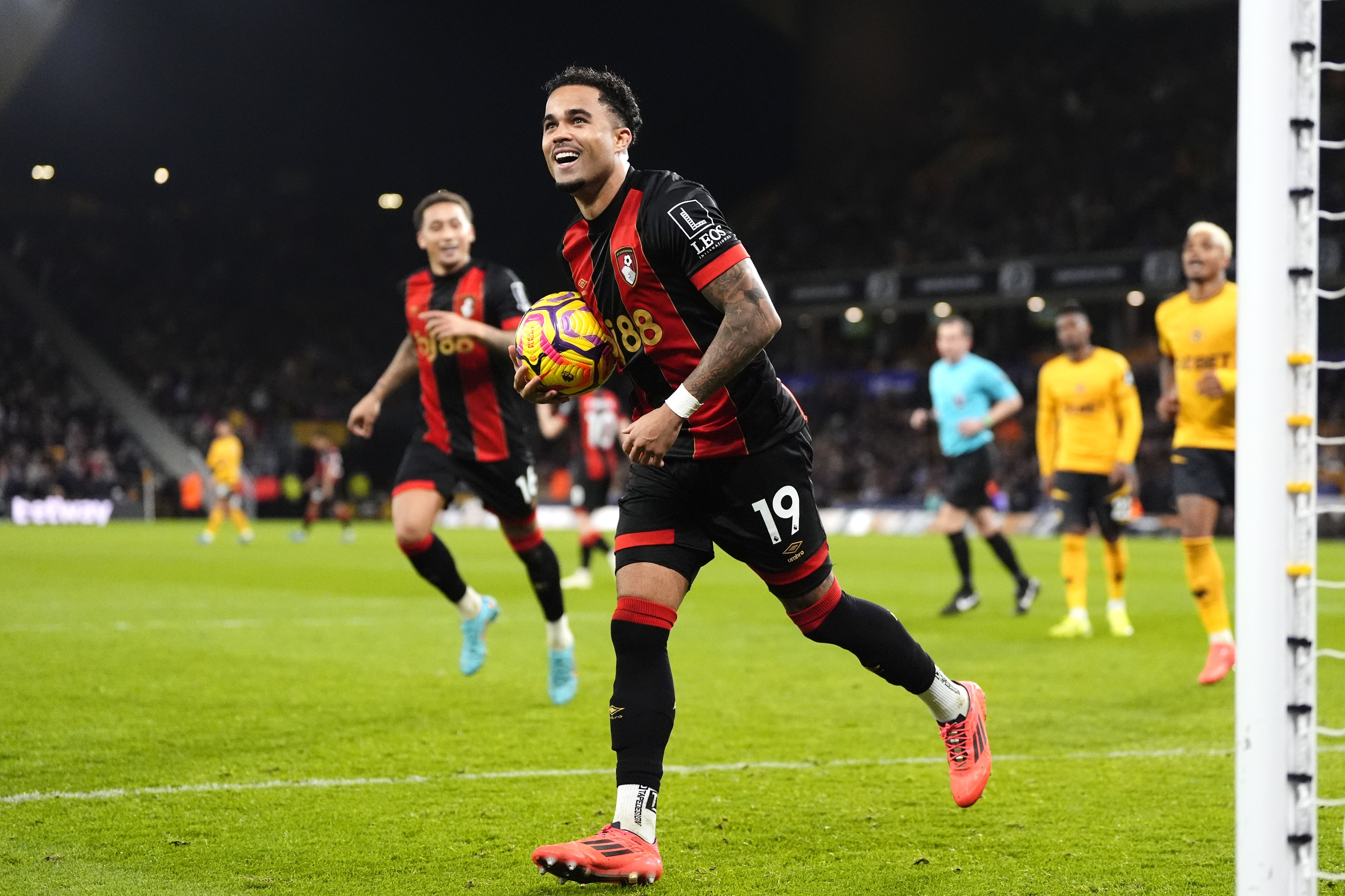 Bournemouth’s Justin Kluivert celebrates completing a hat-trick of penalties against Wolves (Nick Potts/PA).