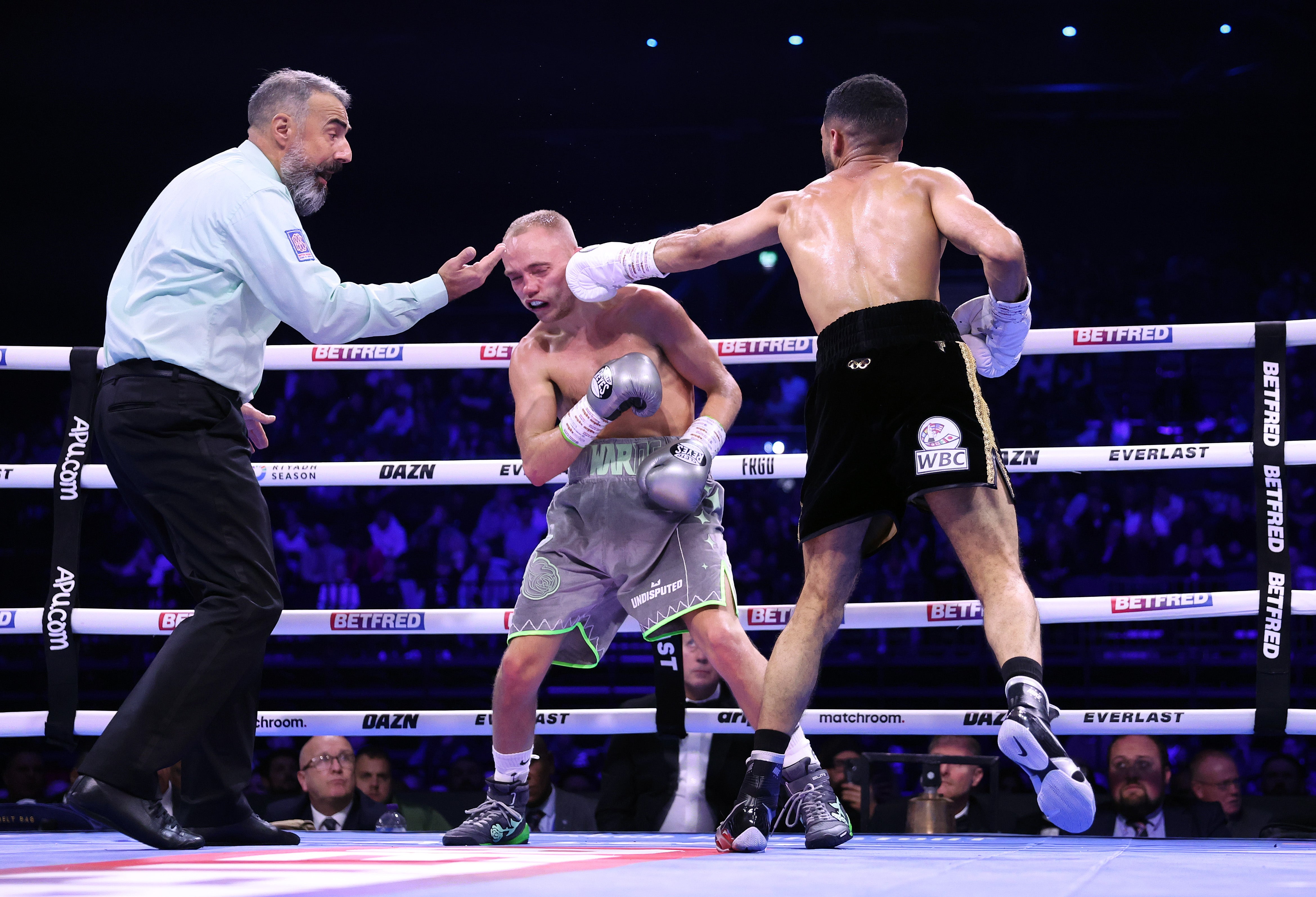 Galal Yafai punches Sunny Edwards as referee Lee Every reacts