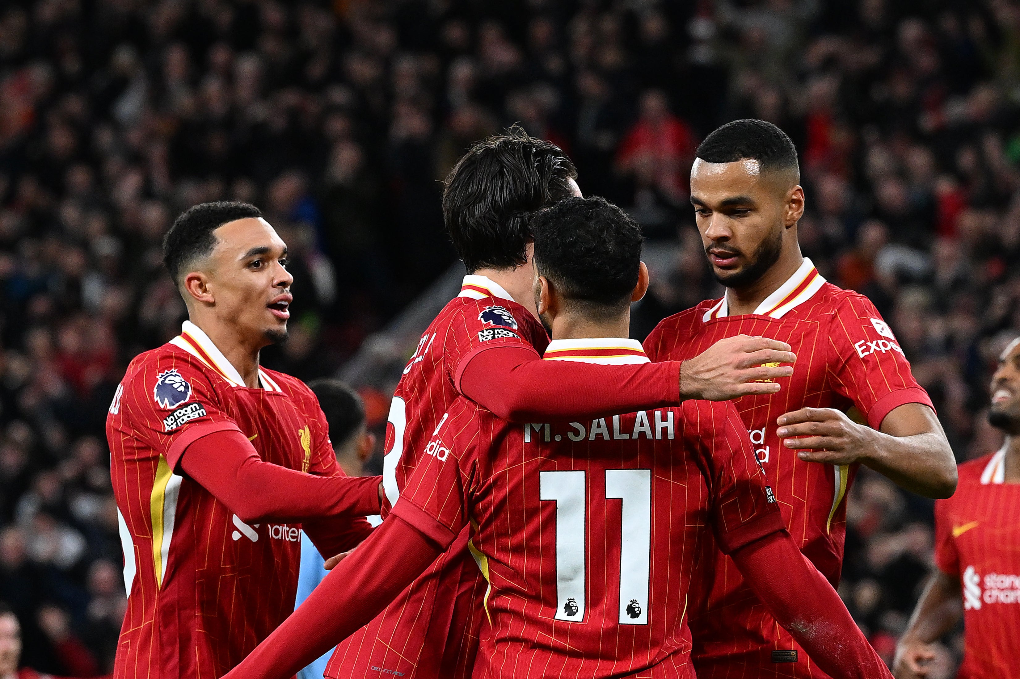 Liverpool celebrate taking the lead against Man City