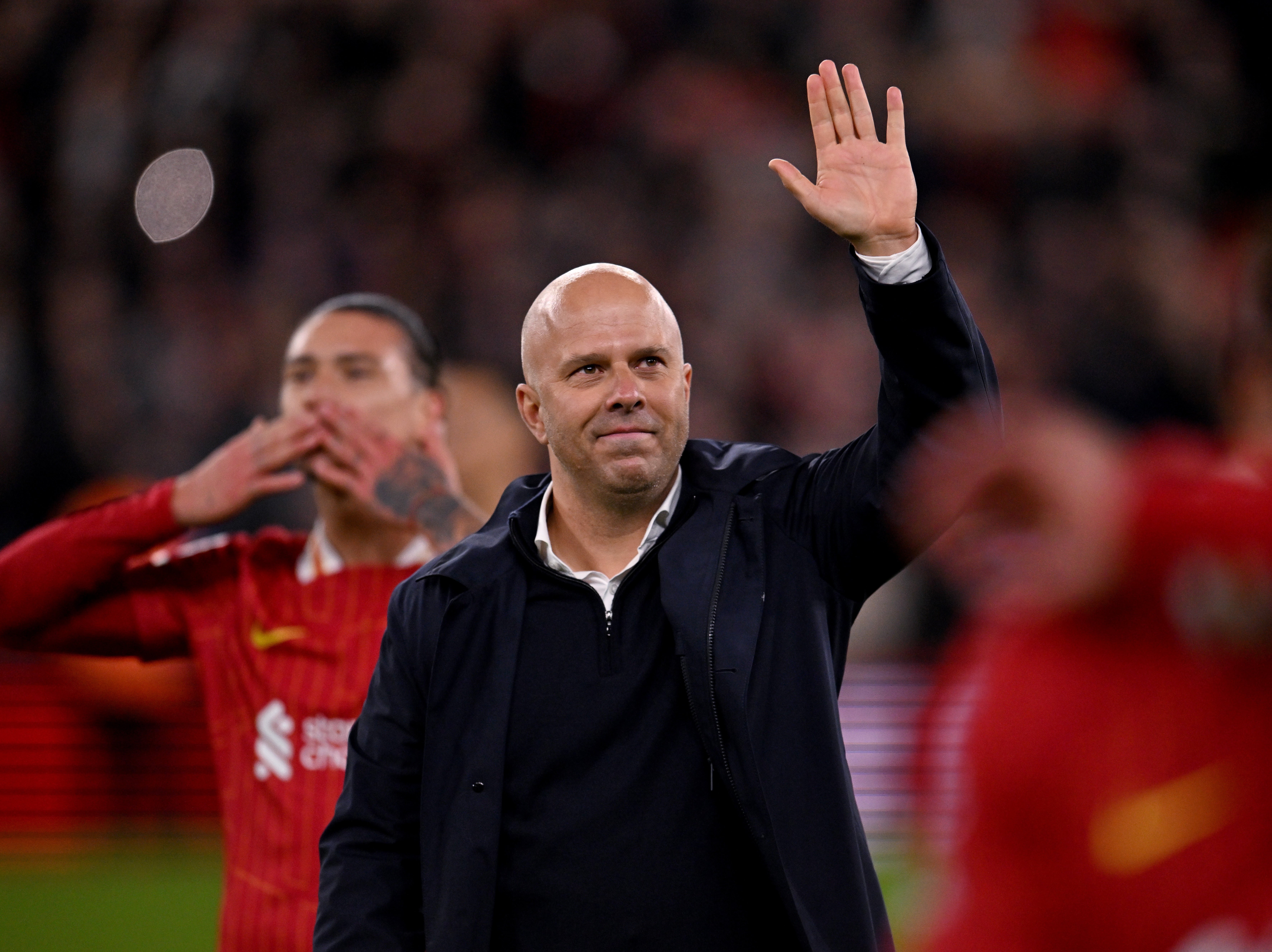 Arne Slot head coach of Liverpool showing his appreciation to the fans