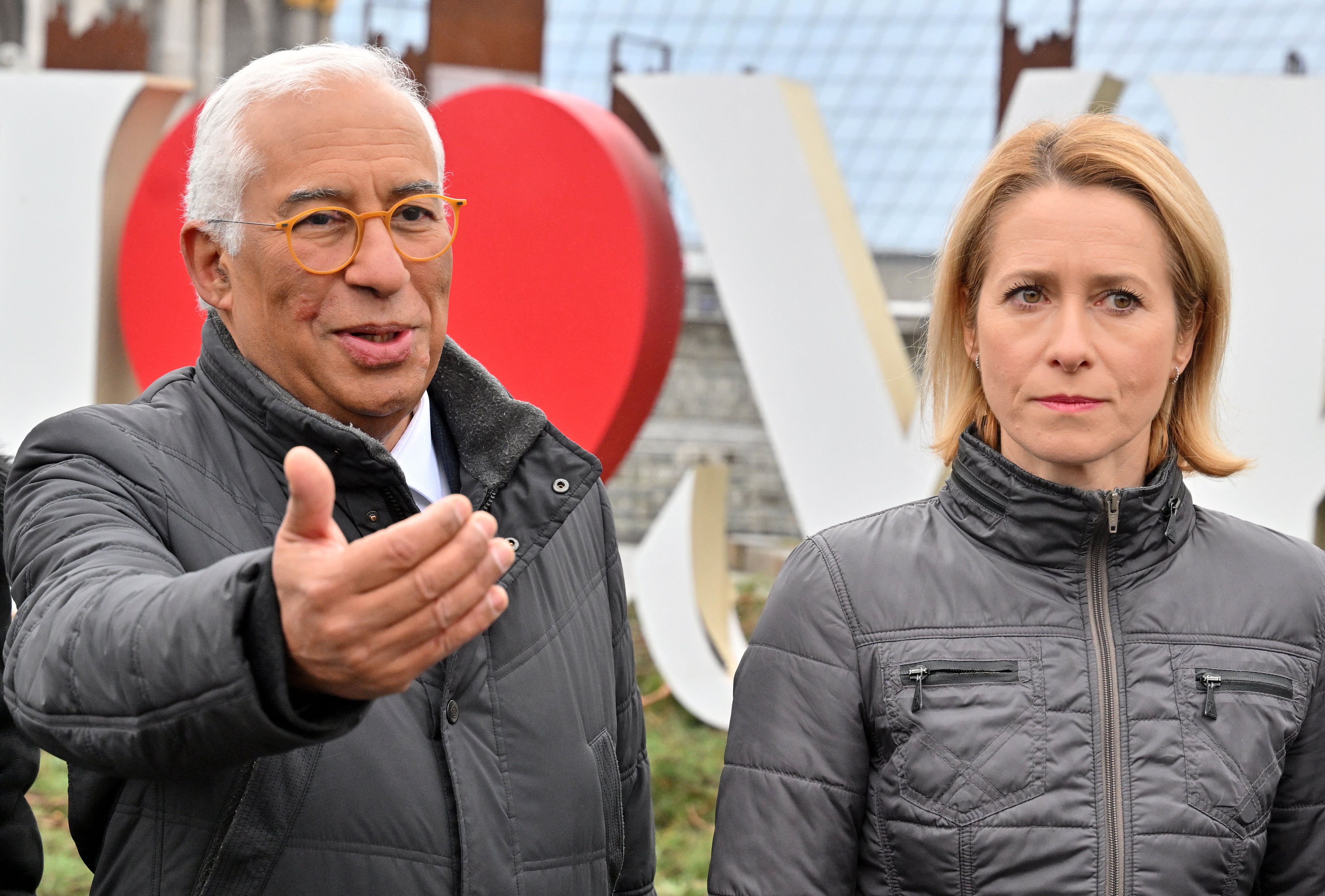 European Council president Antonio Costa and the EU’s new top diplomat Kaja Kallas walk at Independence Square in Kyiv