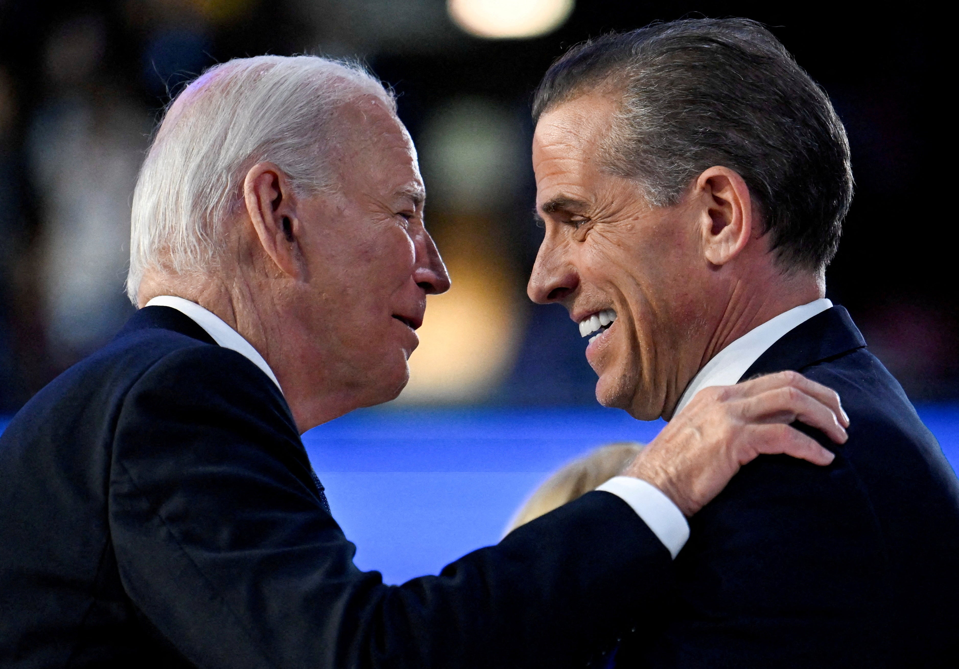 Biden, pictured greeting his son Hunter at the Democratic National Convention in August, pardoned his second son on Sunday