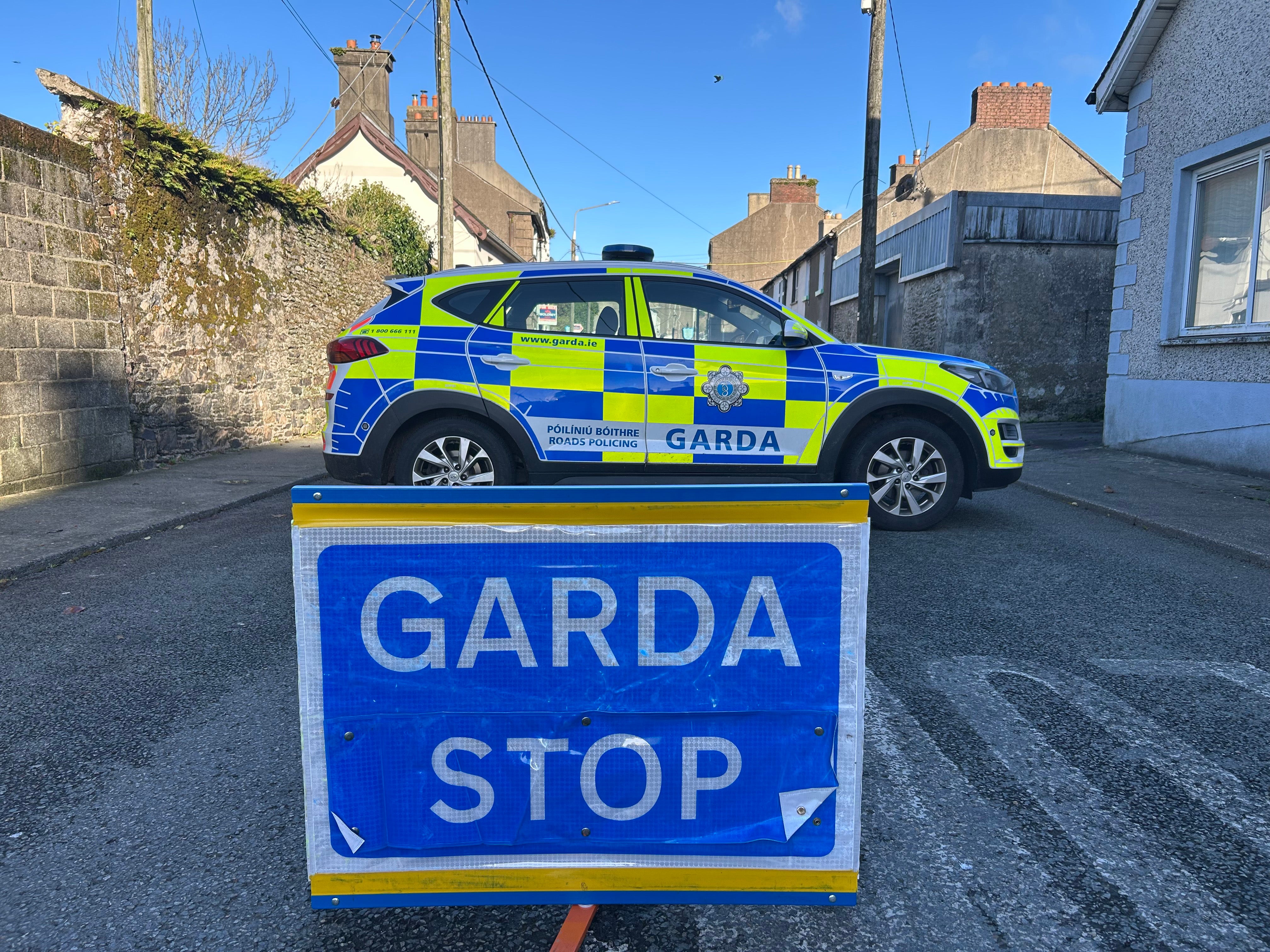 Garda seal off the scene close to where the schoolgirl was killed