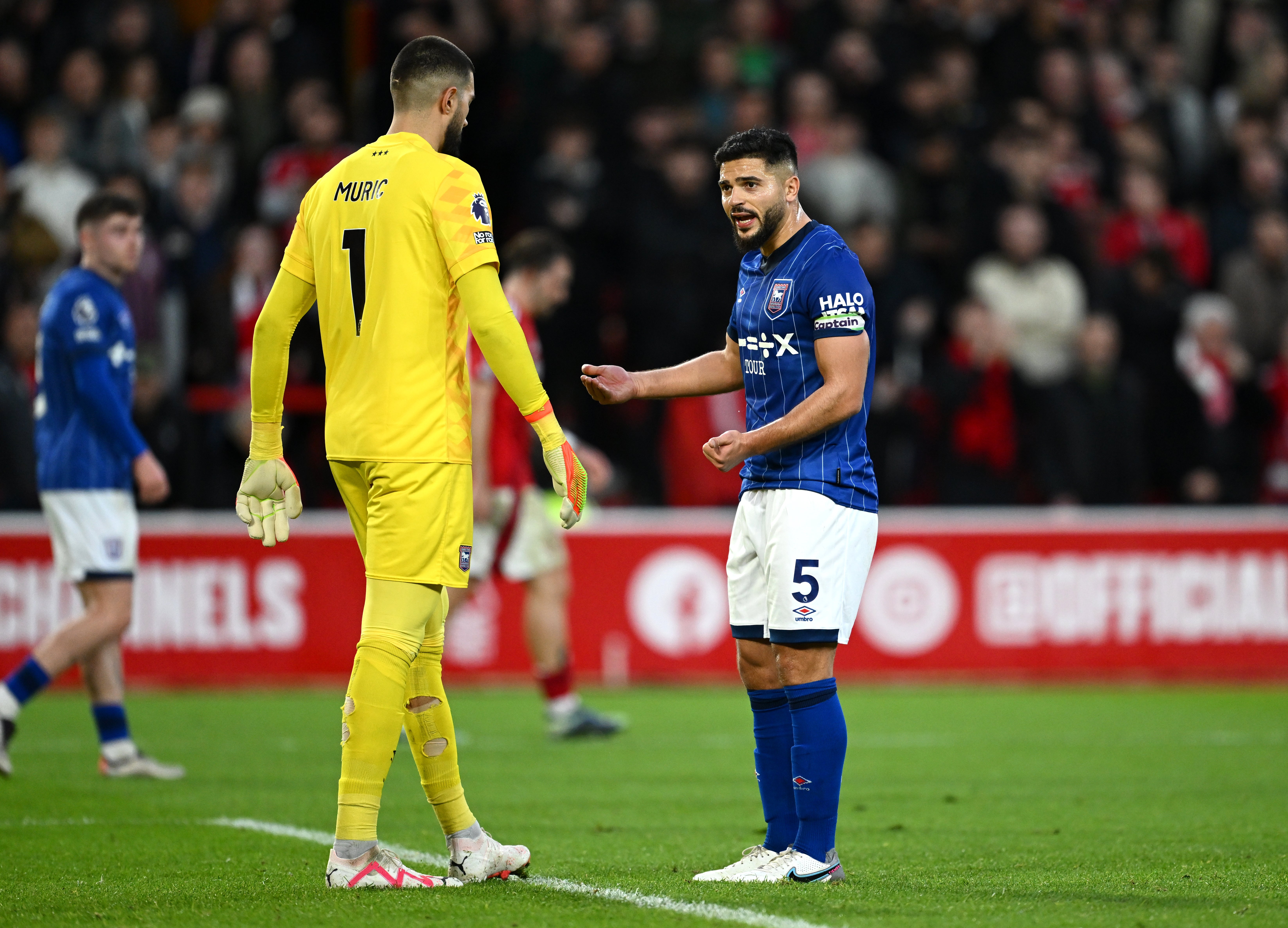 Sam Morsy of Ipswich Town reacts as he speaks with Arijanet Muric