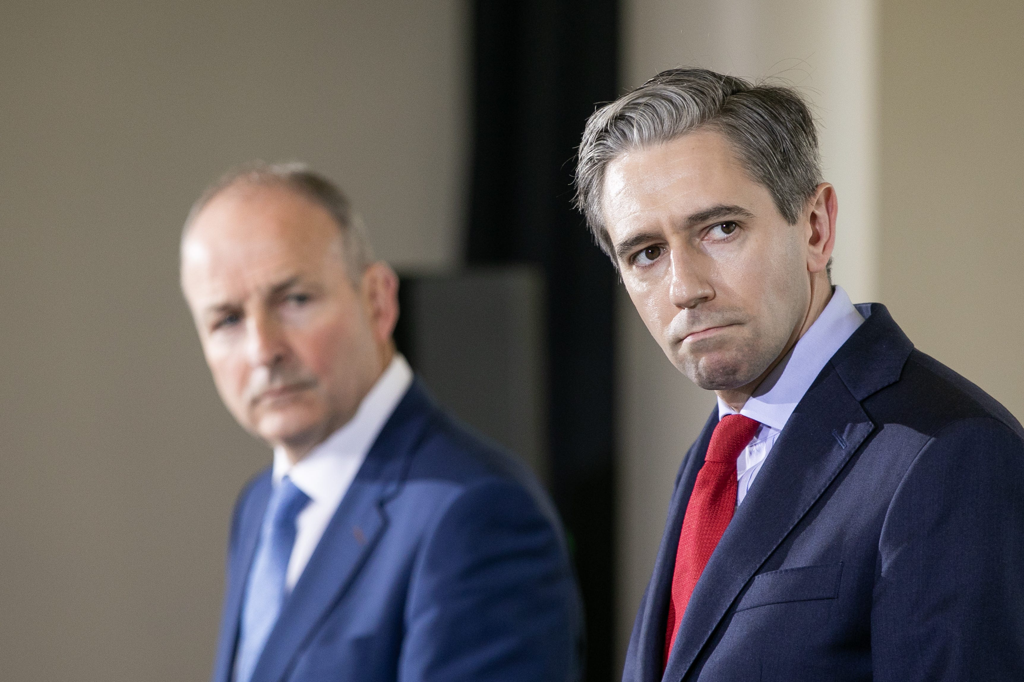 Fianna Fail leader Micheal Martin (left) and Fine Gael leader Simon Harris (Gareth Chaney/PA)