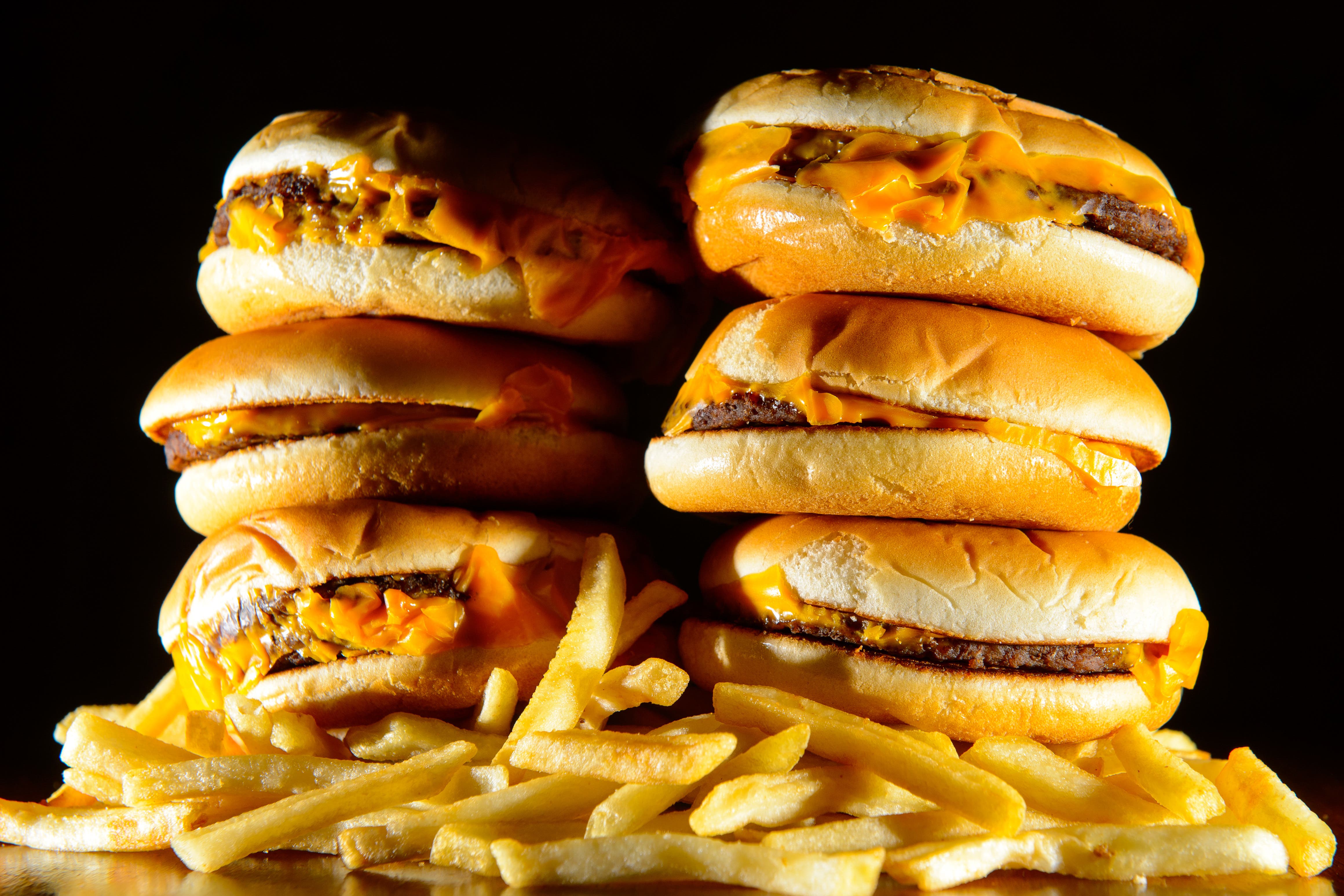 Junk food adverts will be banned before the watershed on TV and online from 2025 (Dominic Lipinski/PA)