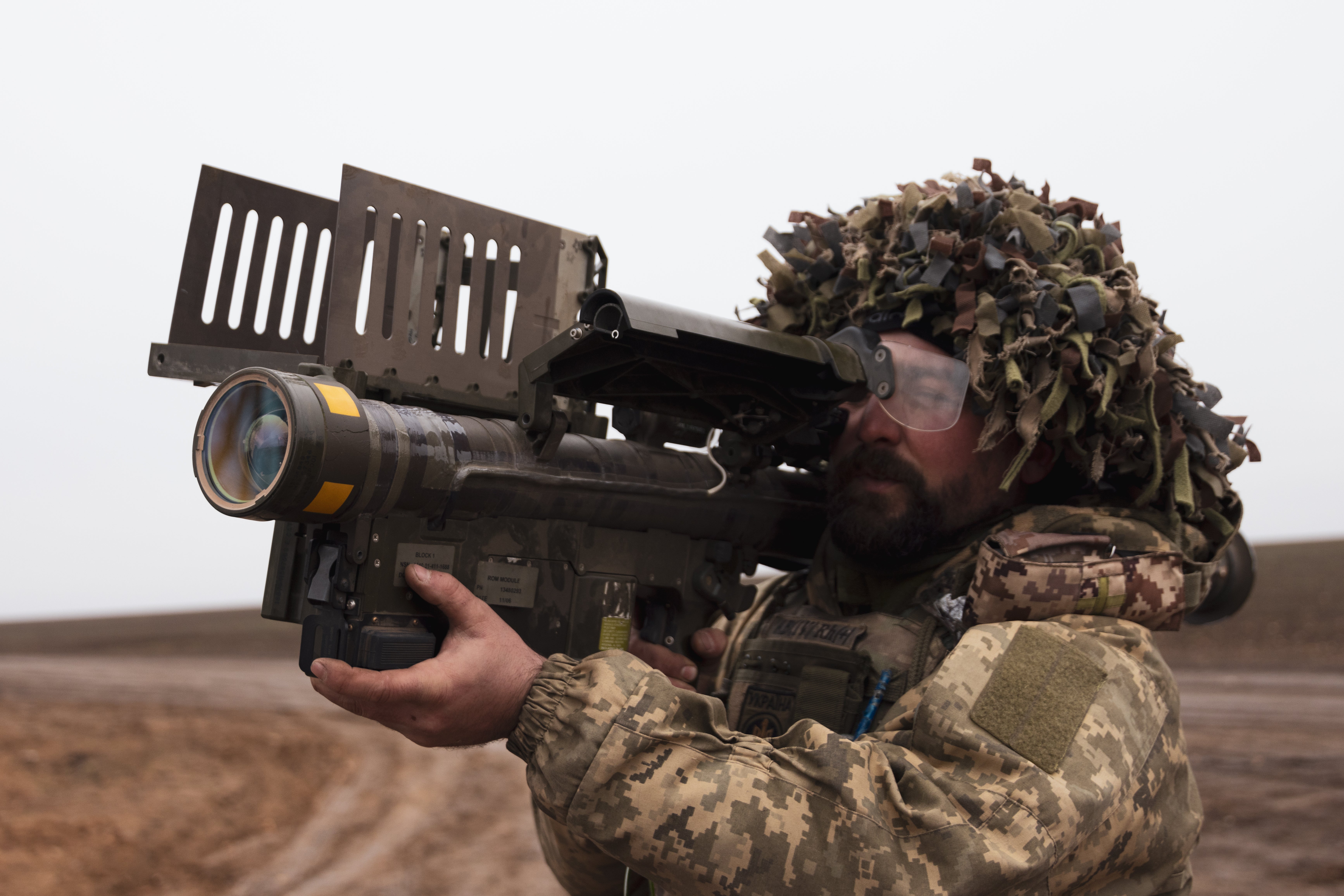 A machine gunner with the 118th Separate Mechanised Brigade’s firing team holds an American FIM-92 Stinger man-portable air defence missile system for reconnaissance and destruction of Russian drones