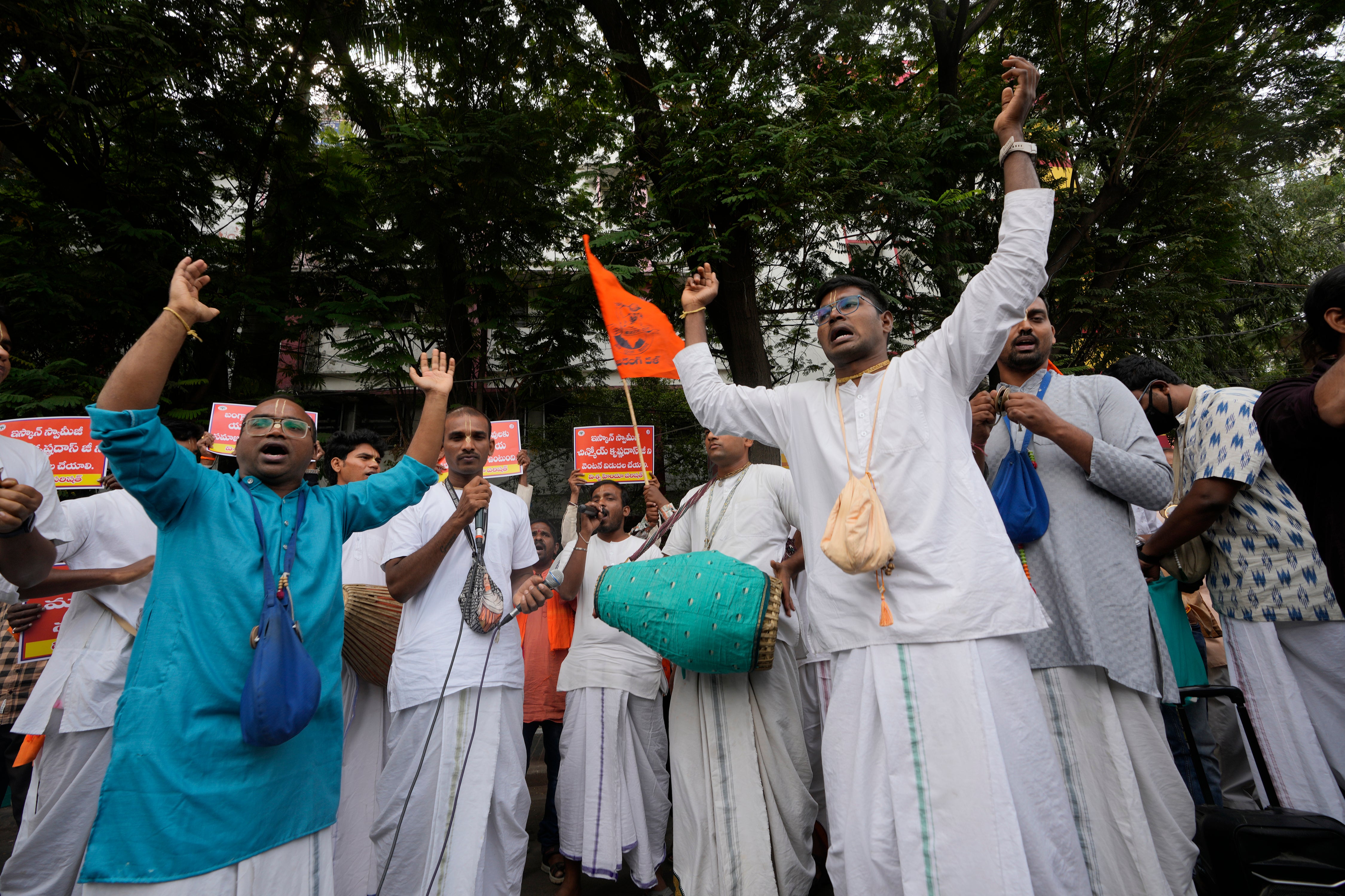 Members of International Society for Krishna Consciousness stage a protest organised by the Vishwa Hindu Parishad against the arrest of Bangladesh Hindu priest Chinmoy Krishna Das, in Hyderabad on 30 November 2024