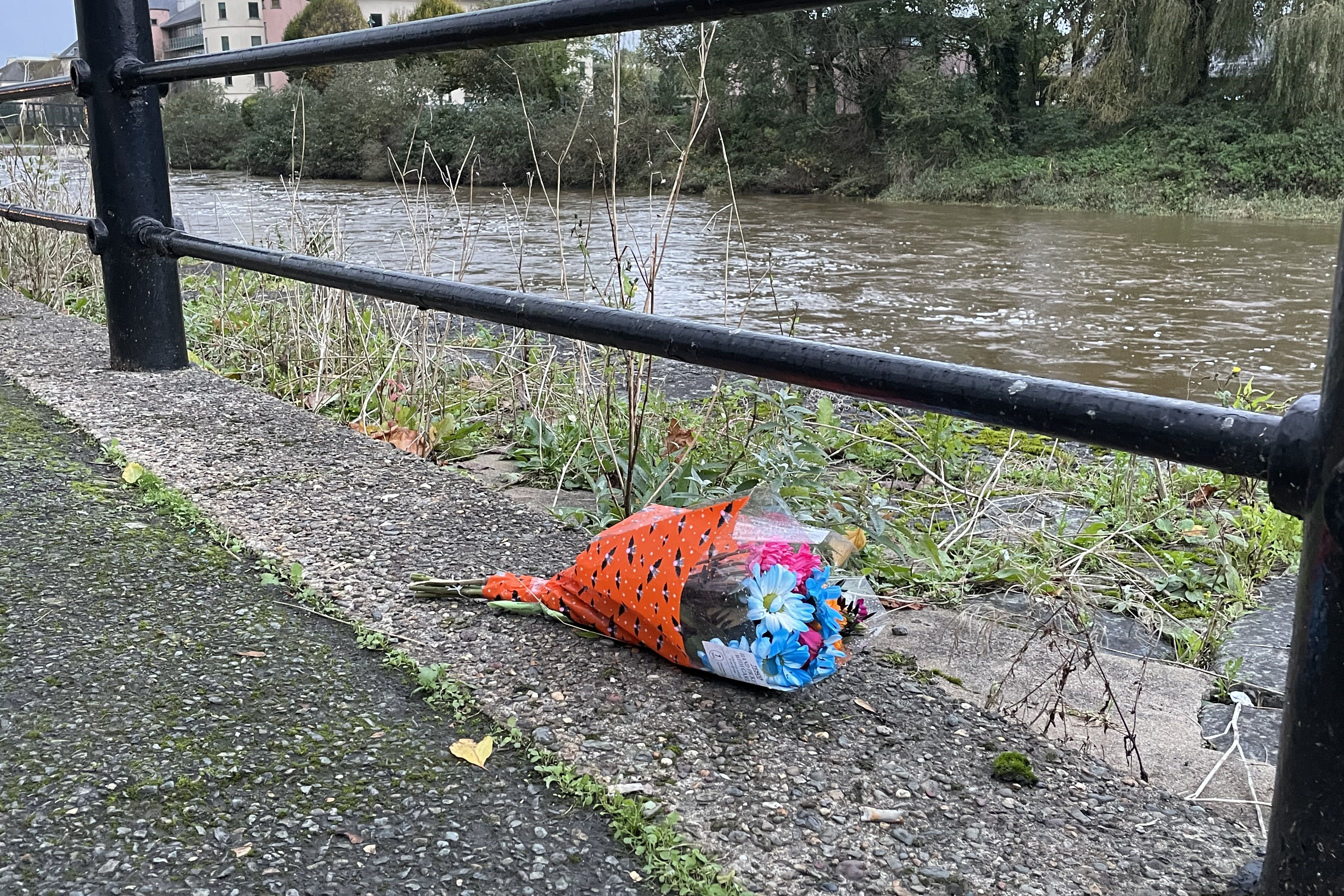 Flowers were left by the river Cleddau in Haverfordwest following the incident (Bronwen Weatherby/PA)