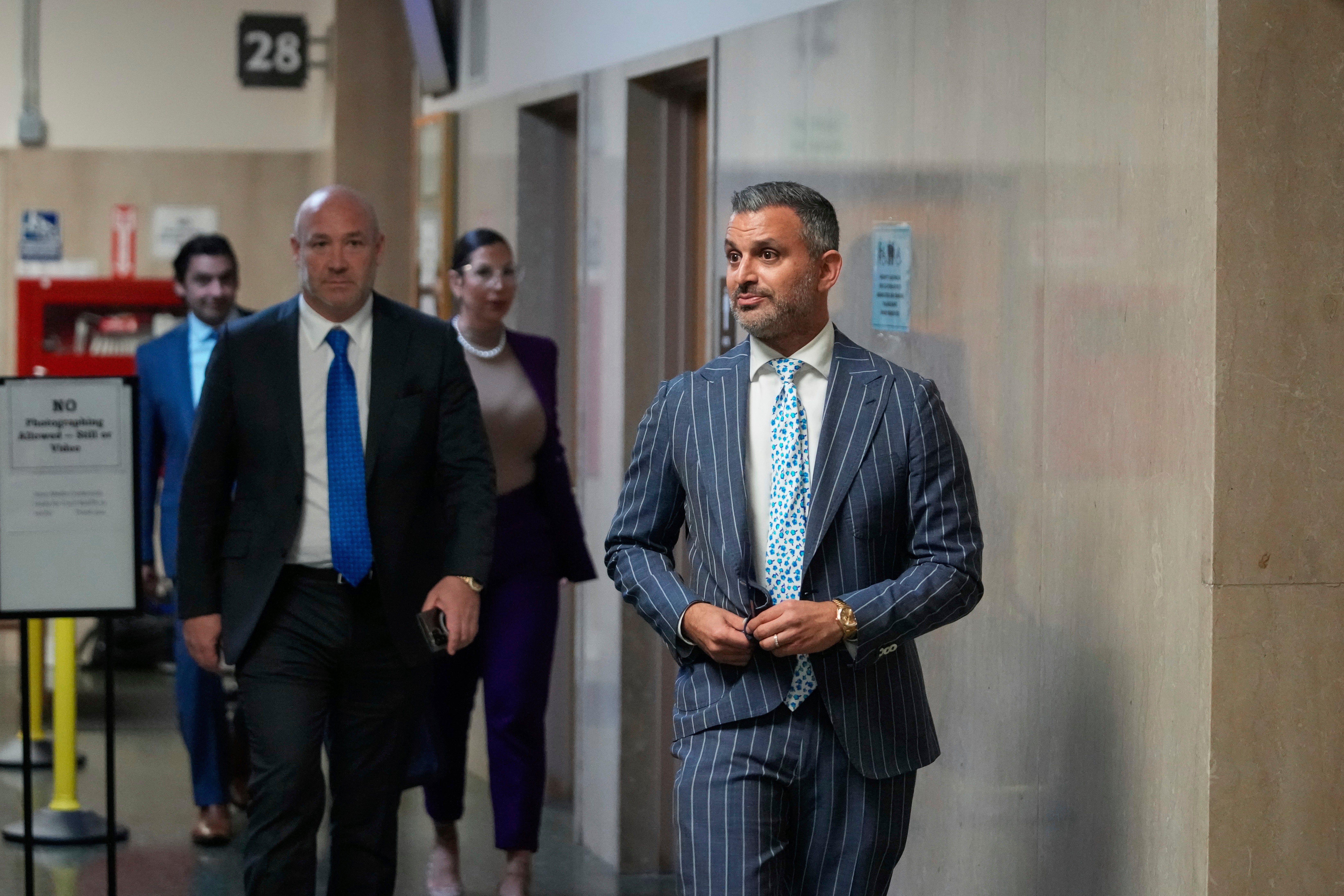 Defense attorney Saam Zangeneh, right, delivered closing arguments at the murder trial of his client, Nima Momeni. Zangeneh questioned why the old “beat-up” paring knife used in the stabbing was not introduced into evidence so jurors could see it in detail