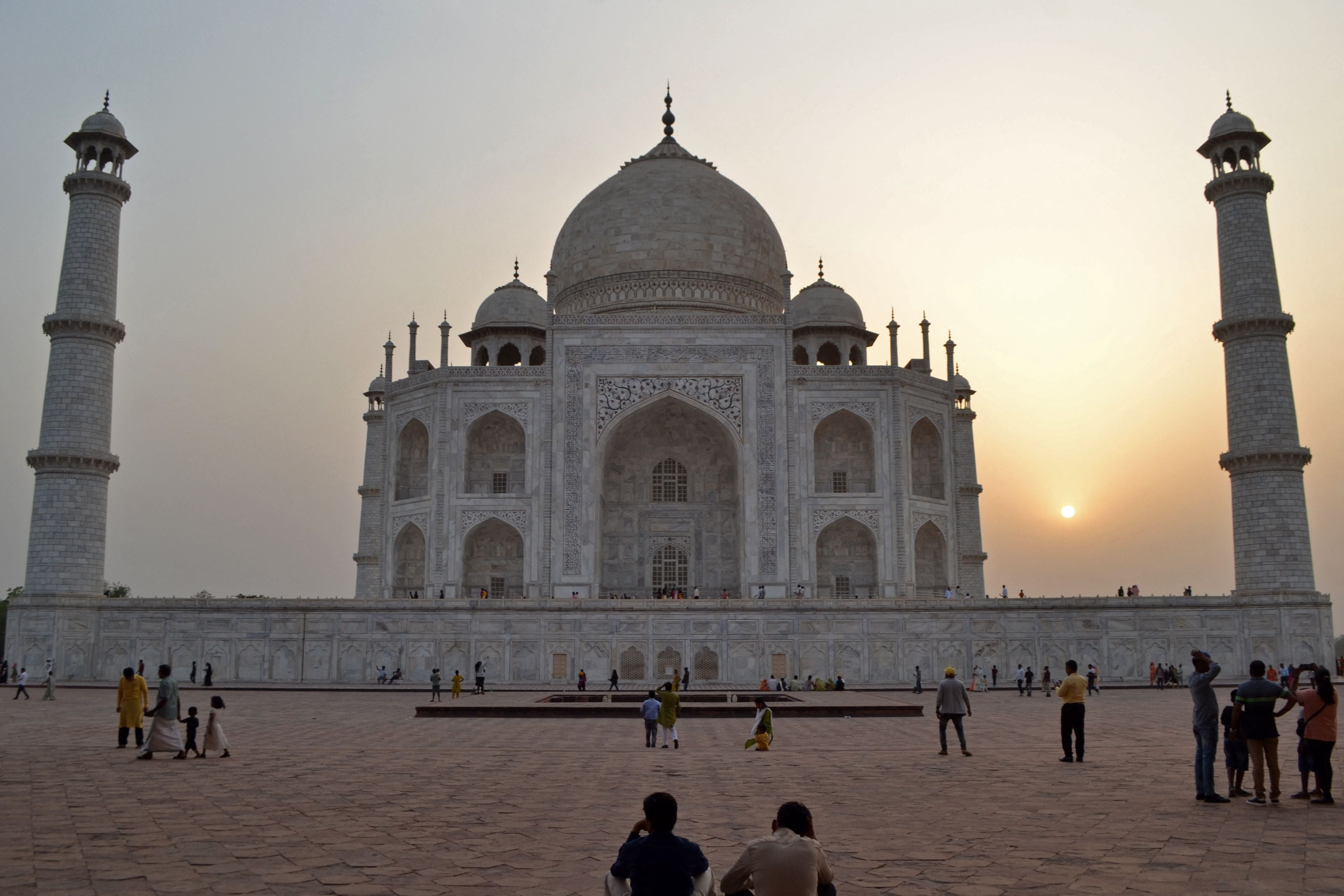 People visit the Taj Mahal in Agra on 19 May 2022