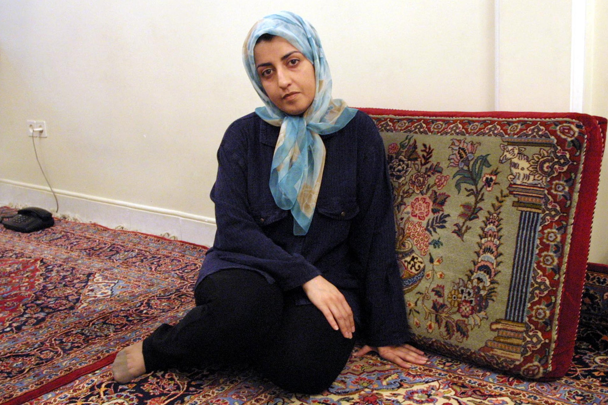 File picture dated 4 September 2001 shows Iranian peace activist Narges Mohammadi at her home in Tehran following her release from prison after posting 100 million rials (12,000 USD) in bail