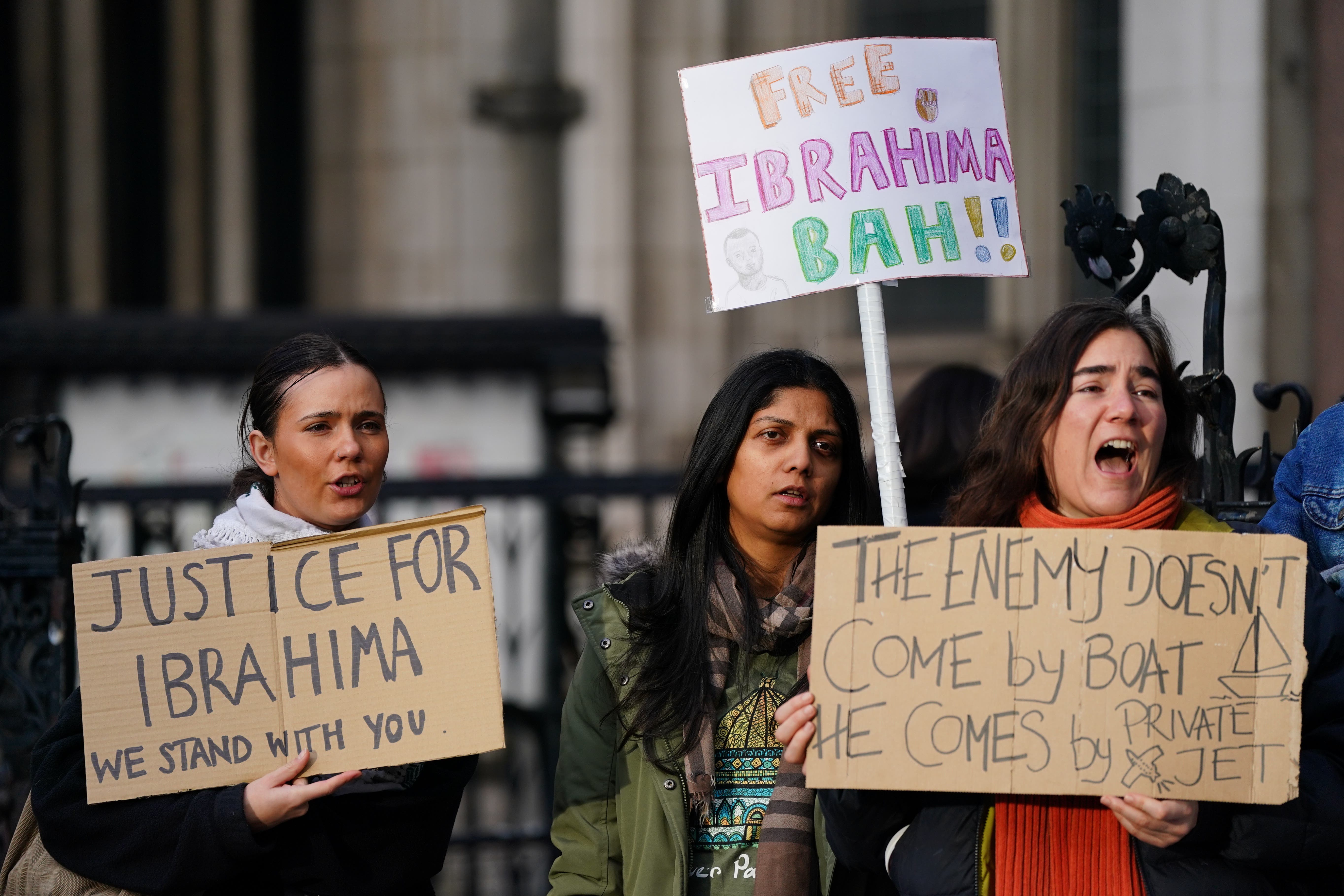 Protesters gathered outside the Royal Courts of Justice in London (Ben Whitley/PA)