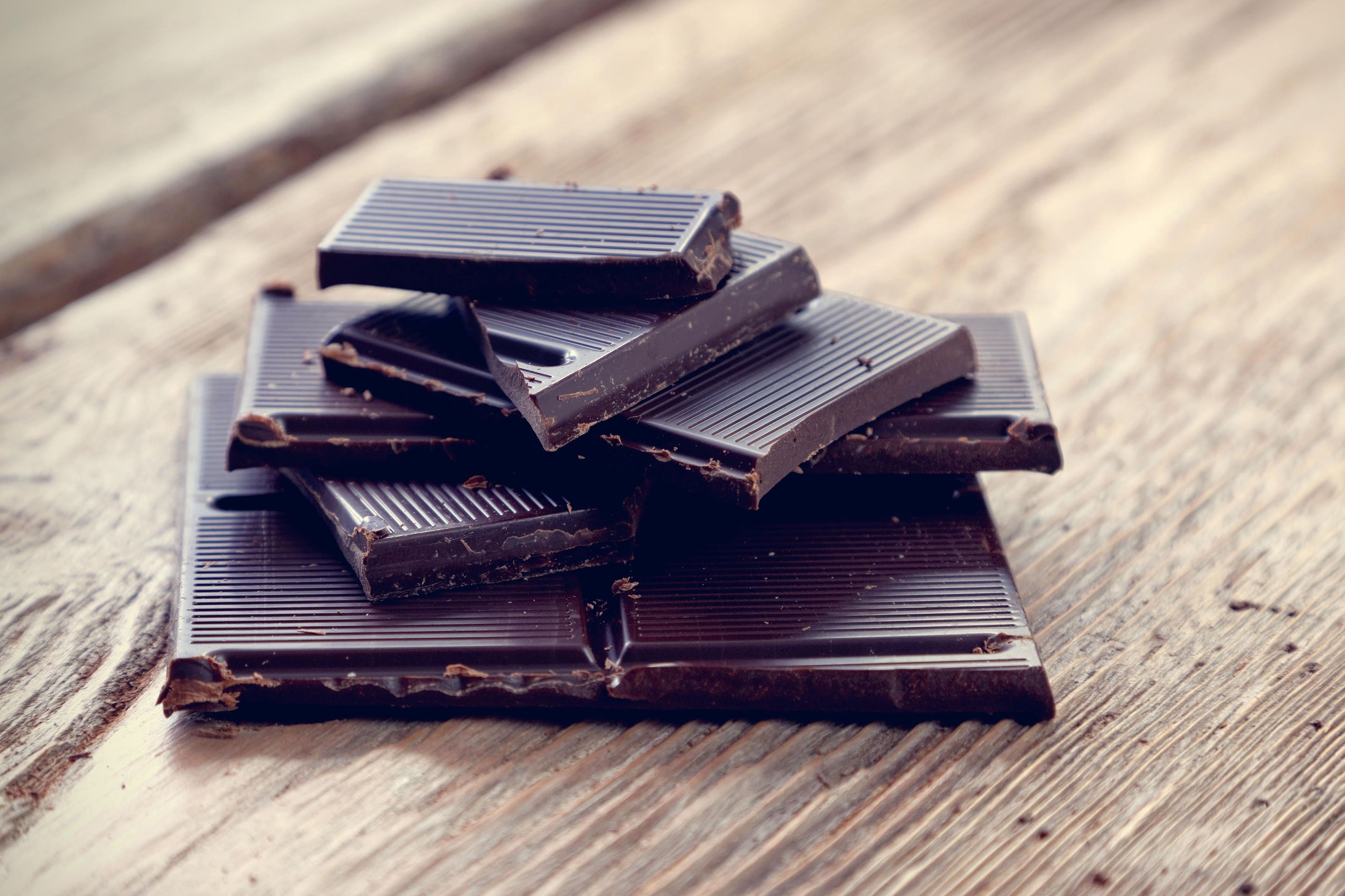 Eating a few pieces of dark chocolate could improve brain performance, research suggests (Alamy/PA)
