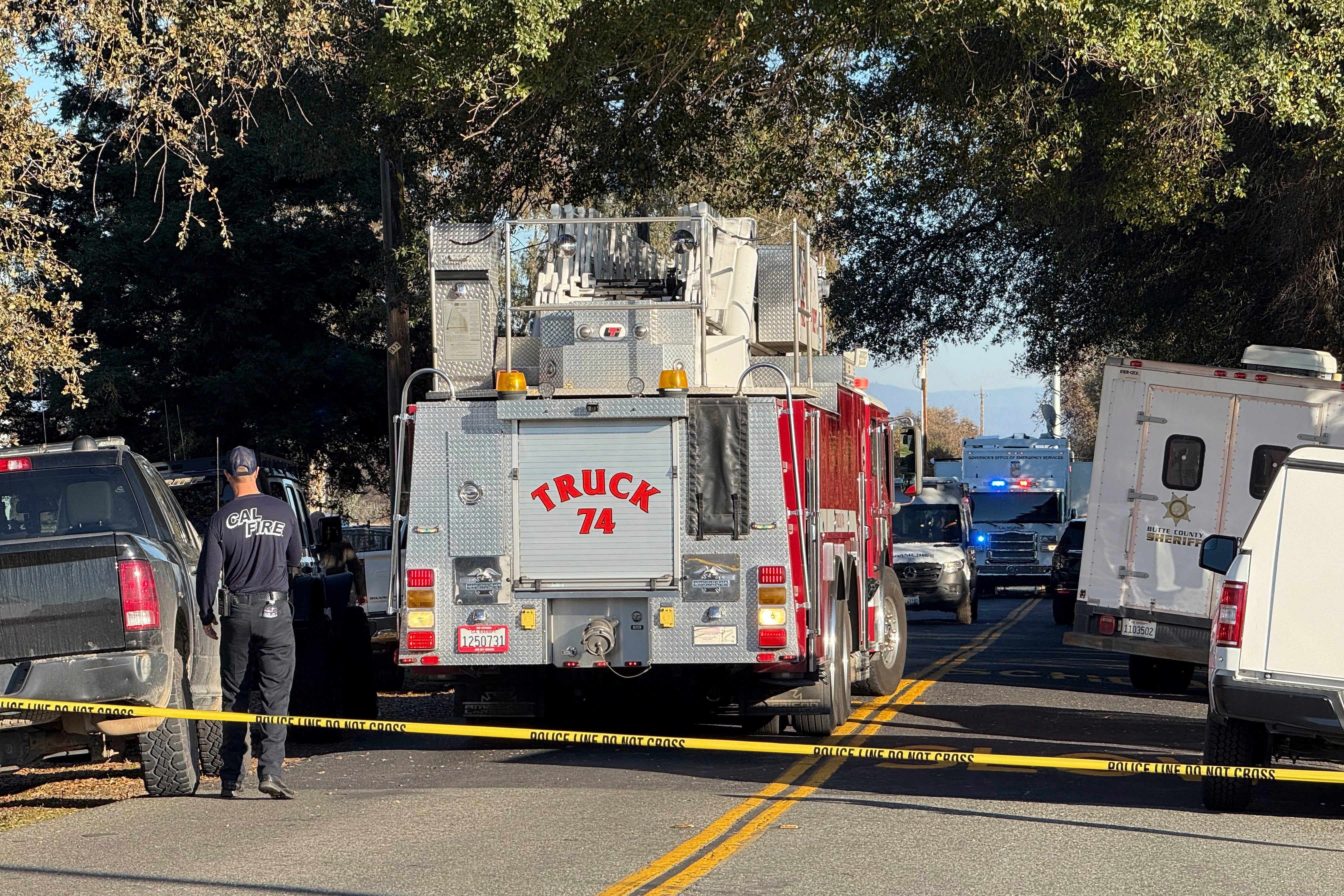 Emergency personnel state outside the Feather River Adventist School after a shooting