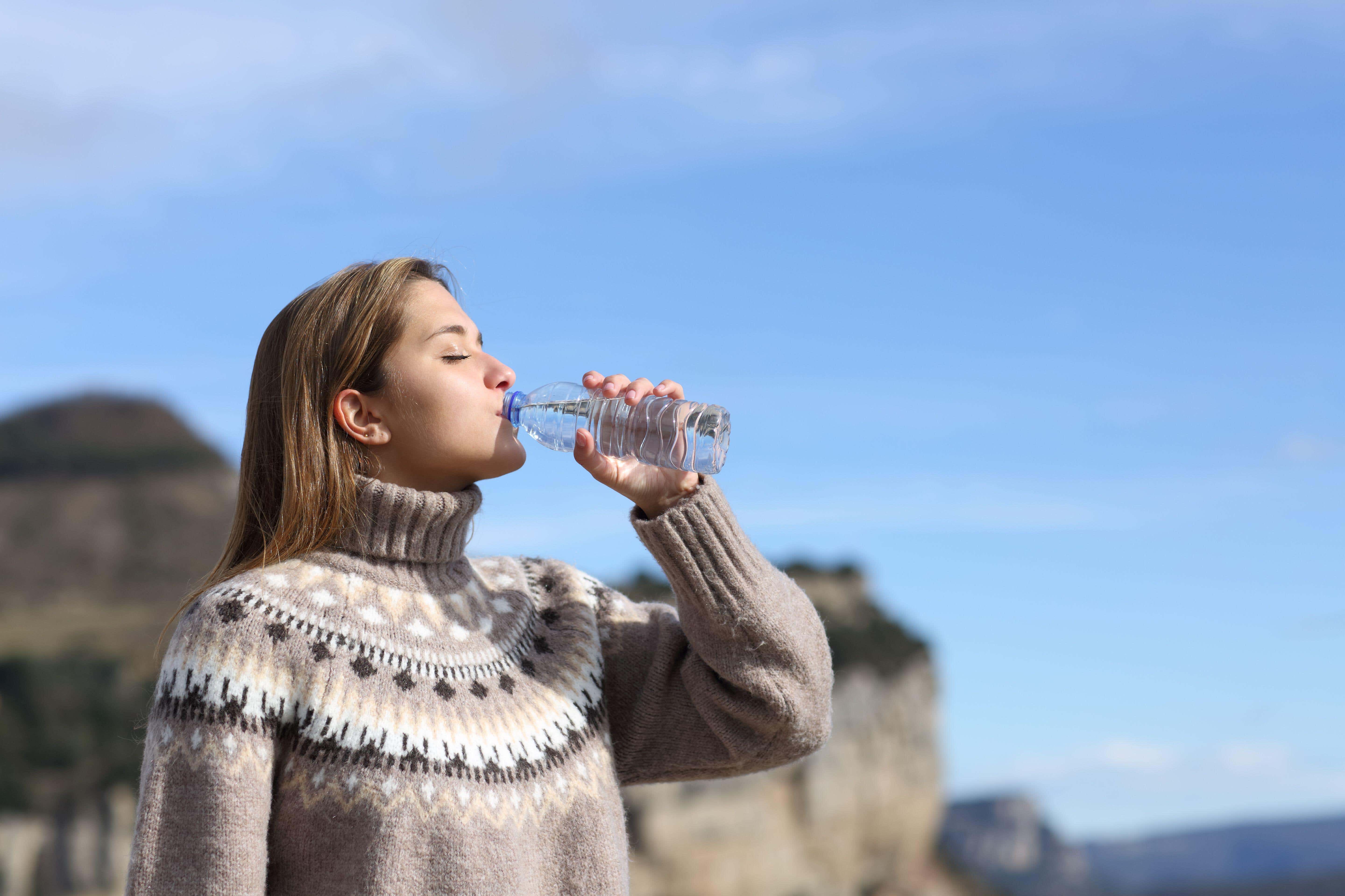 You may not feel as thirsty in colder months, but you must up your liquid intake to stay hydrated (Alamy/PA)