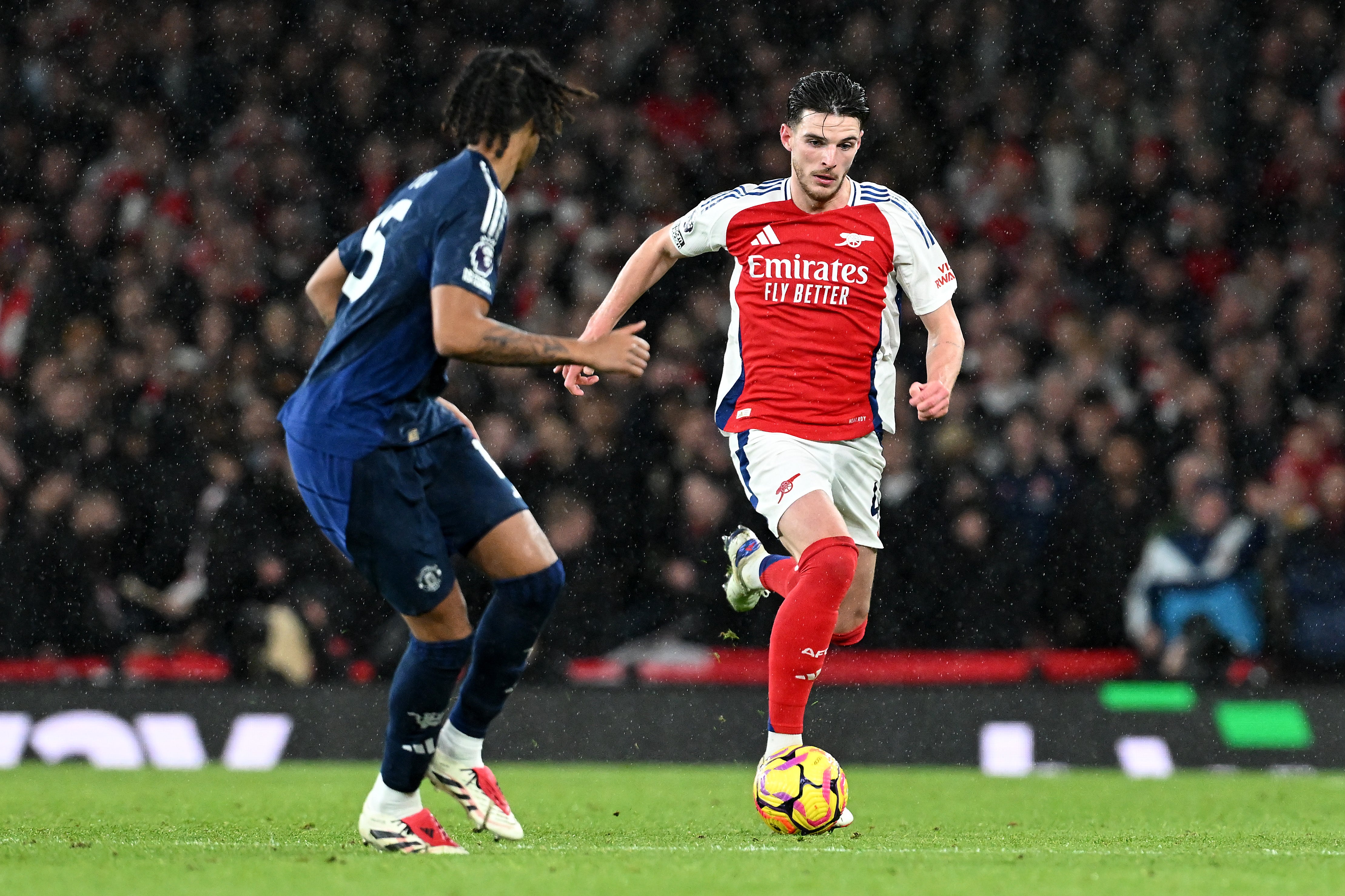 Yoro faces up to Arsenal midfielder Declan Rice