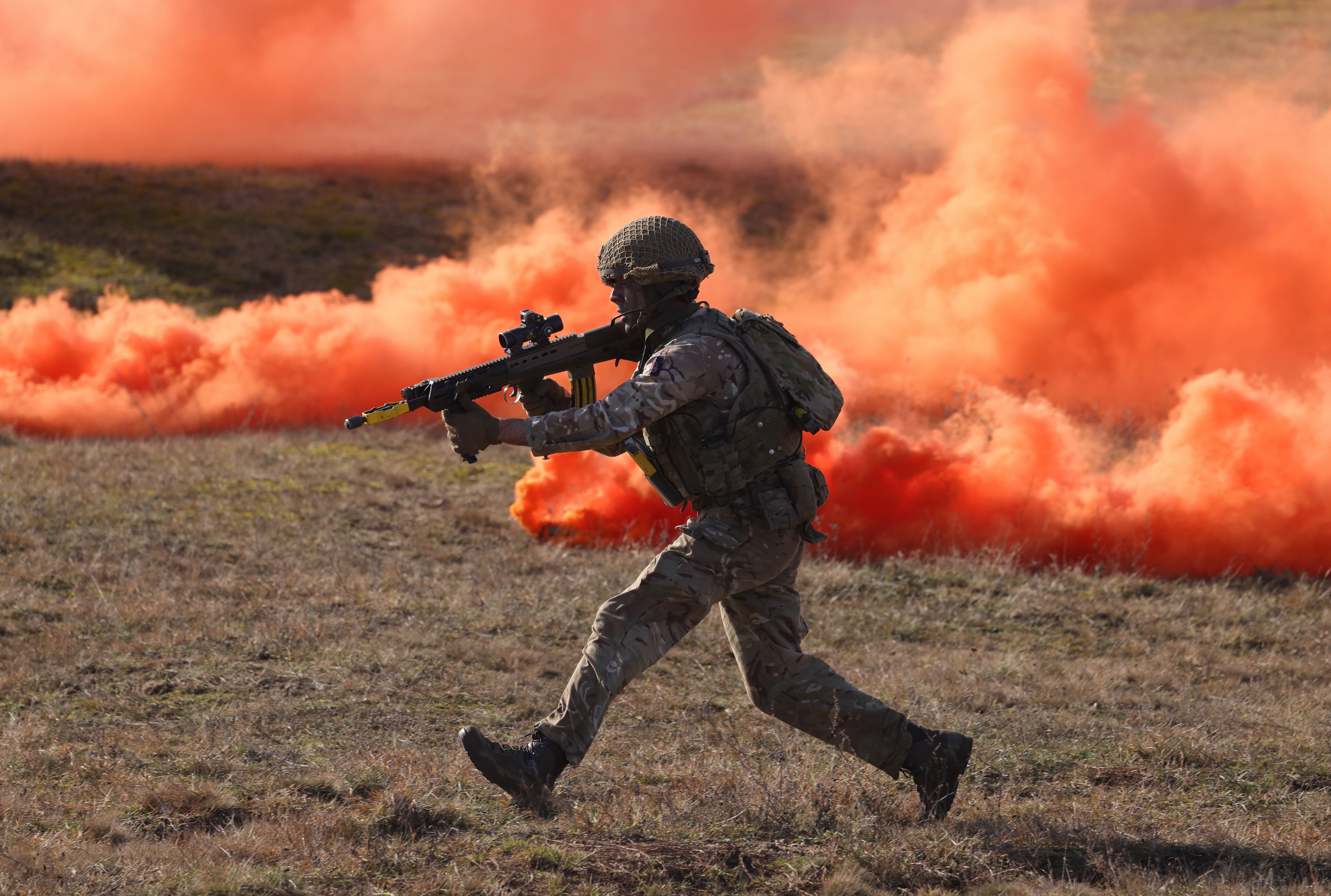 A British soldier takes part in a Nato attack simulation in Drawsko Pomorskie, Poland