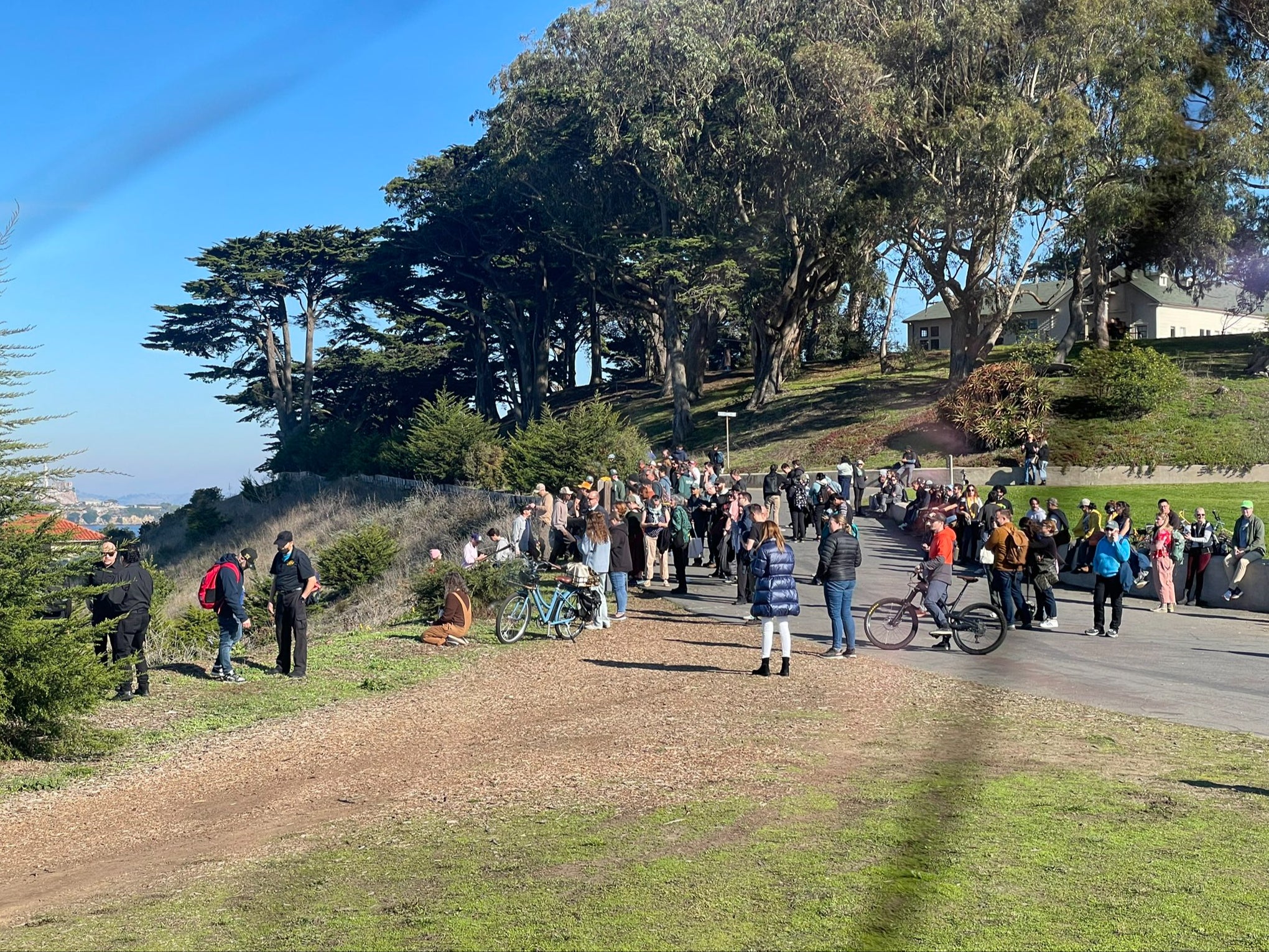 San Franciscans gather atop Fort Mason on Thursday Dec 5, 2024, to watch the expected tsunami