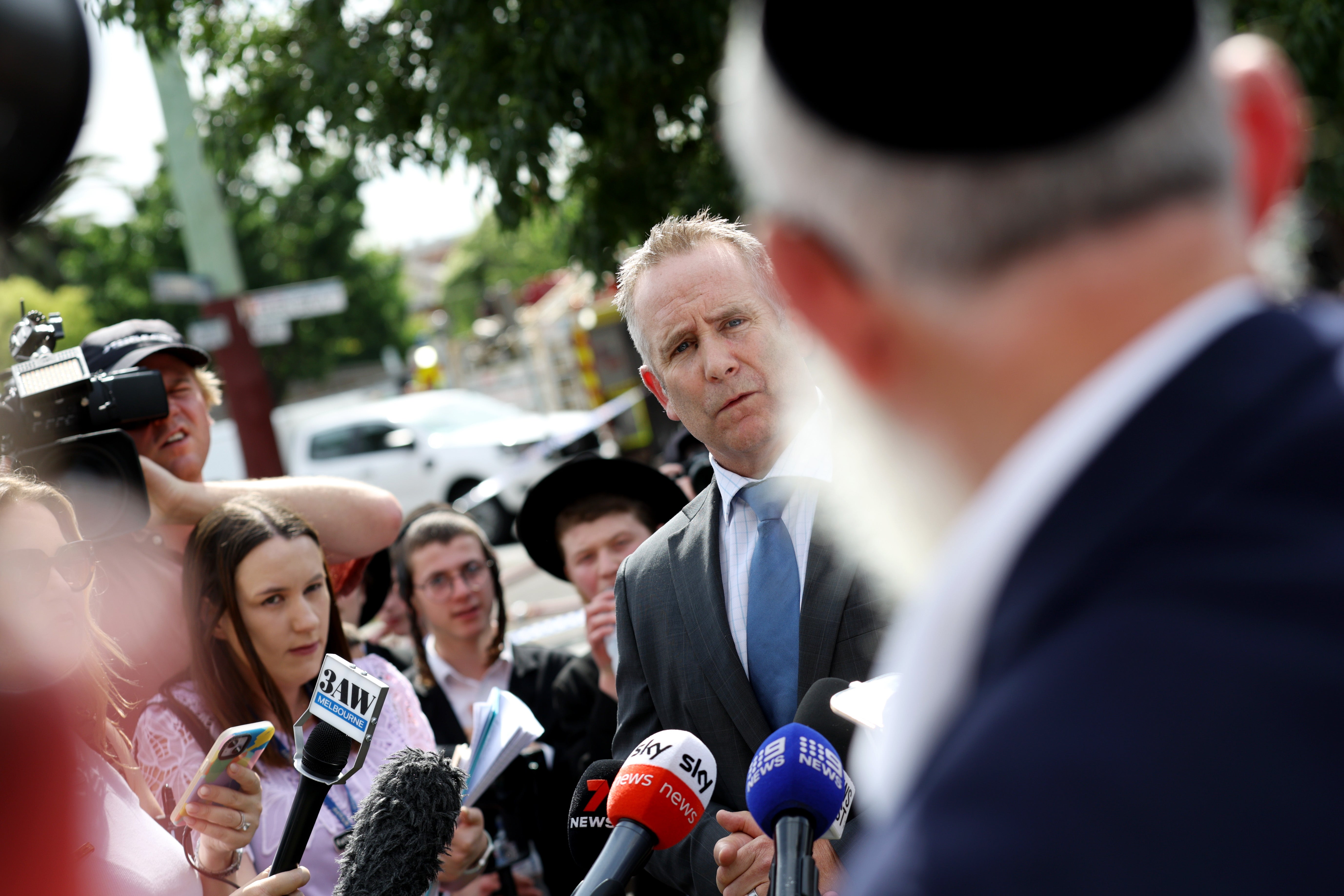 Detective Inspector Chris Murray speaks to the media at the scene of a fire at the Adass Israel Synagogue in Ripponlea, Melbourne