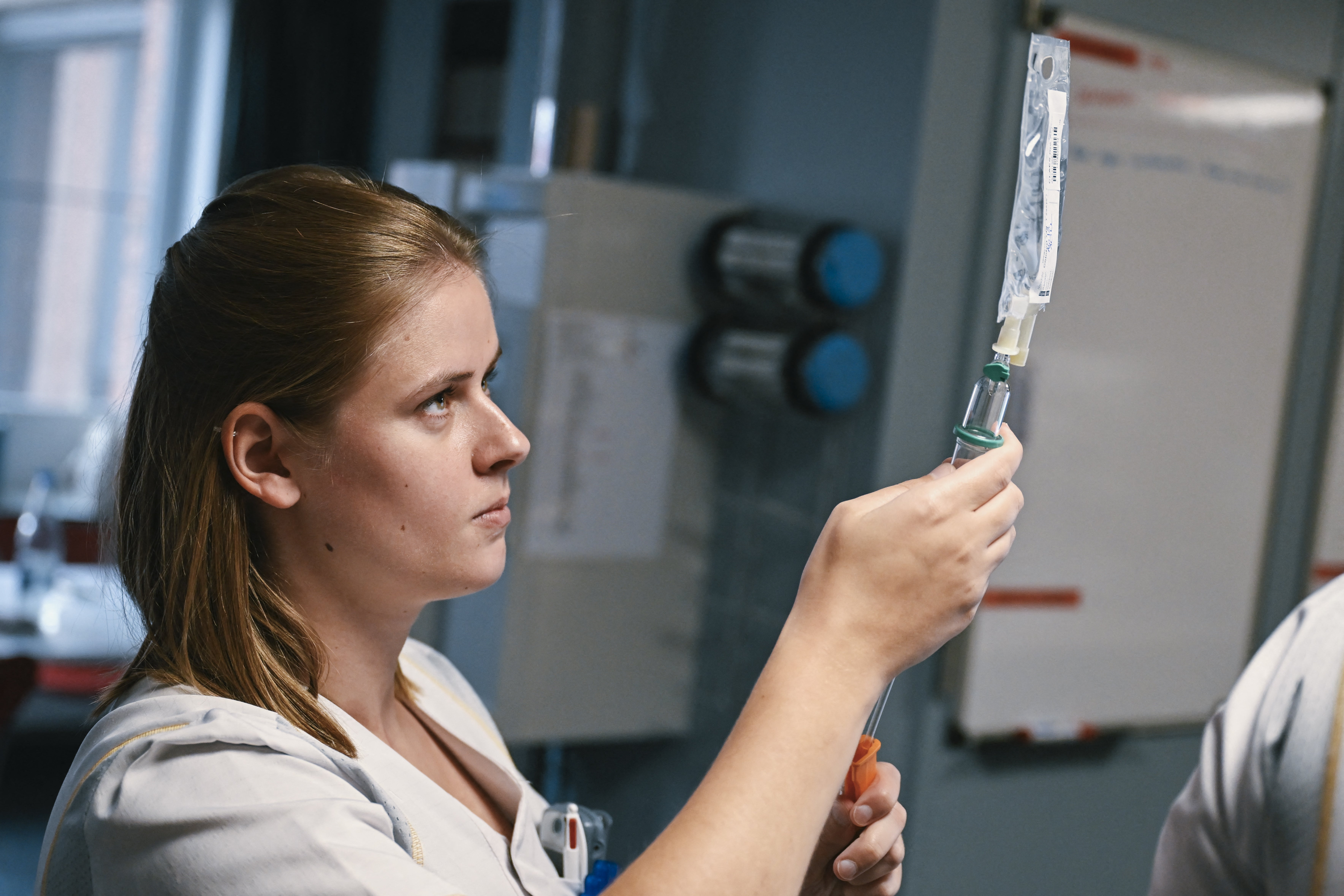 Representational: A nurse preparing an IV bag