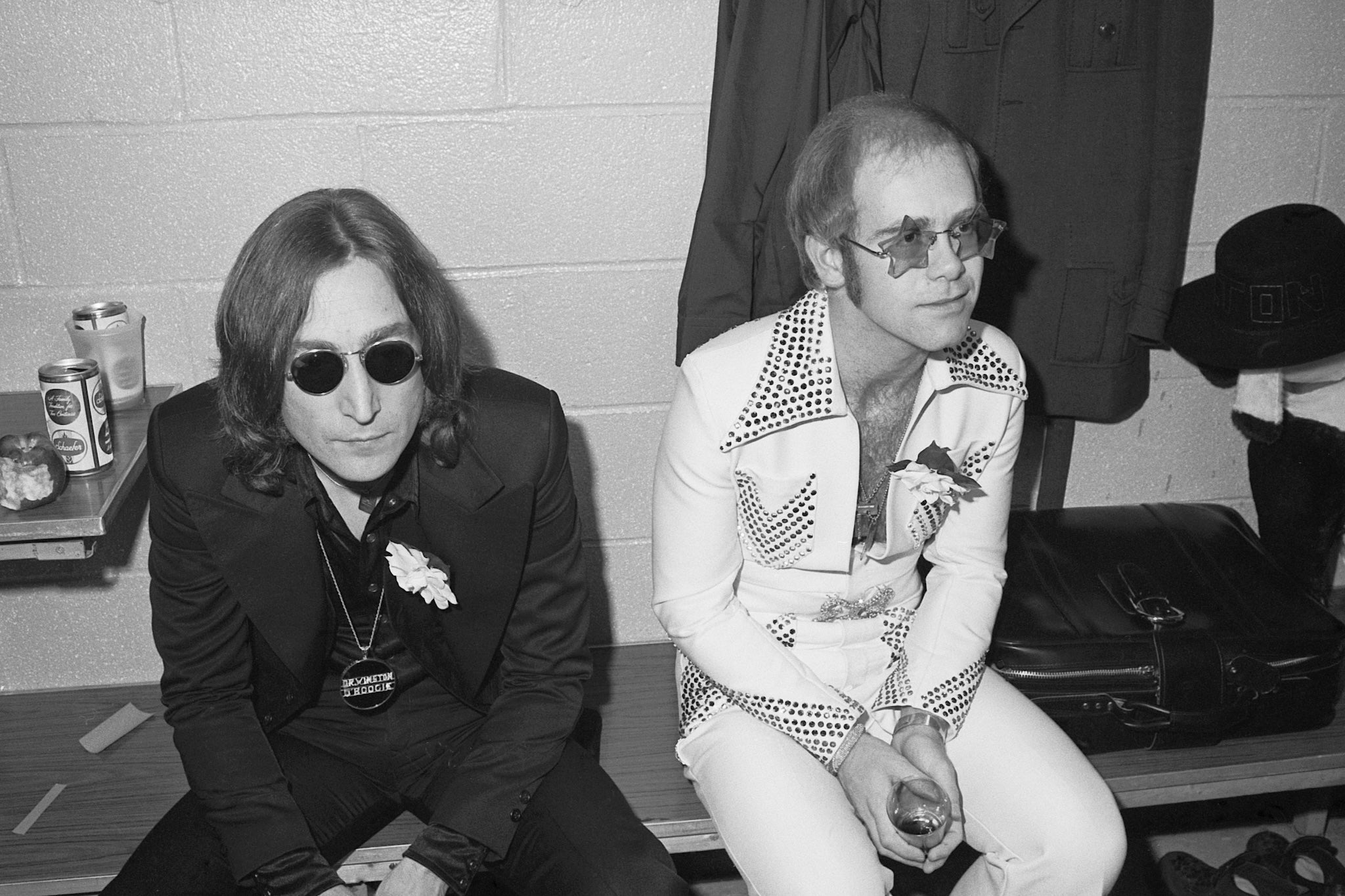 Elton John and John Lennon anxiously wait backstage before performing together at Madison Square Garden in front of a sold-out crowd in 1974