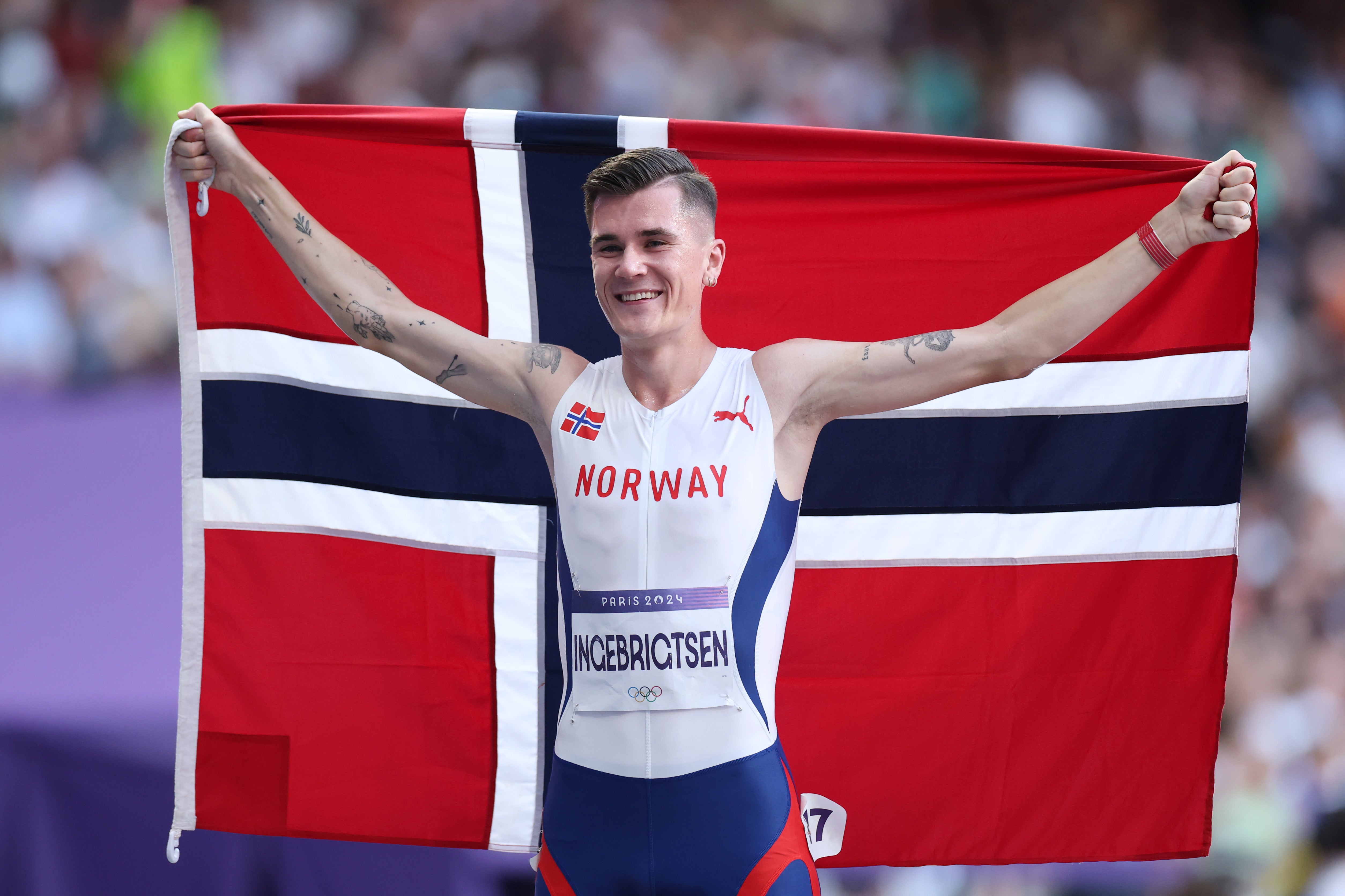 Jakob Ingebrigtsen celebrates winning the 5,000m final at the Paris Olympics