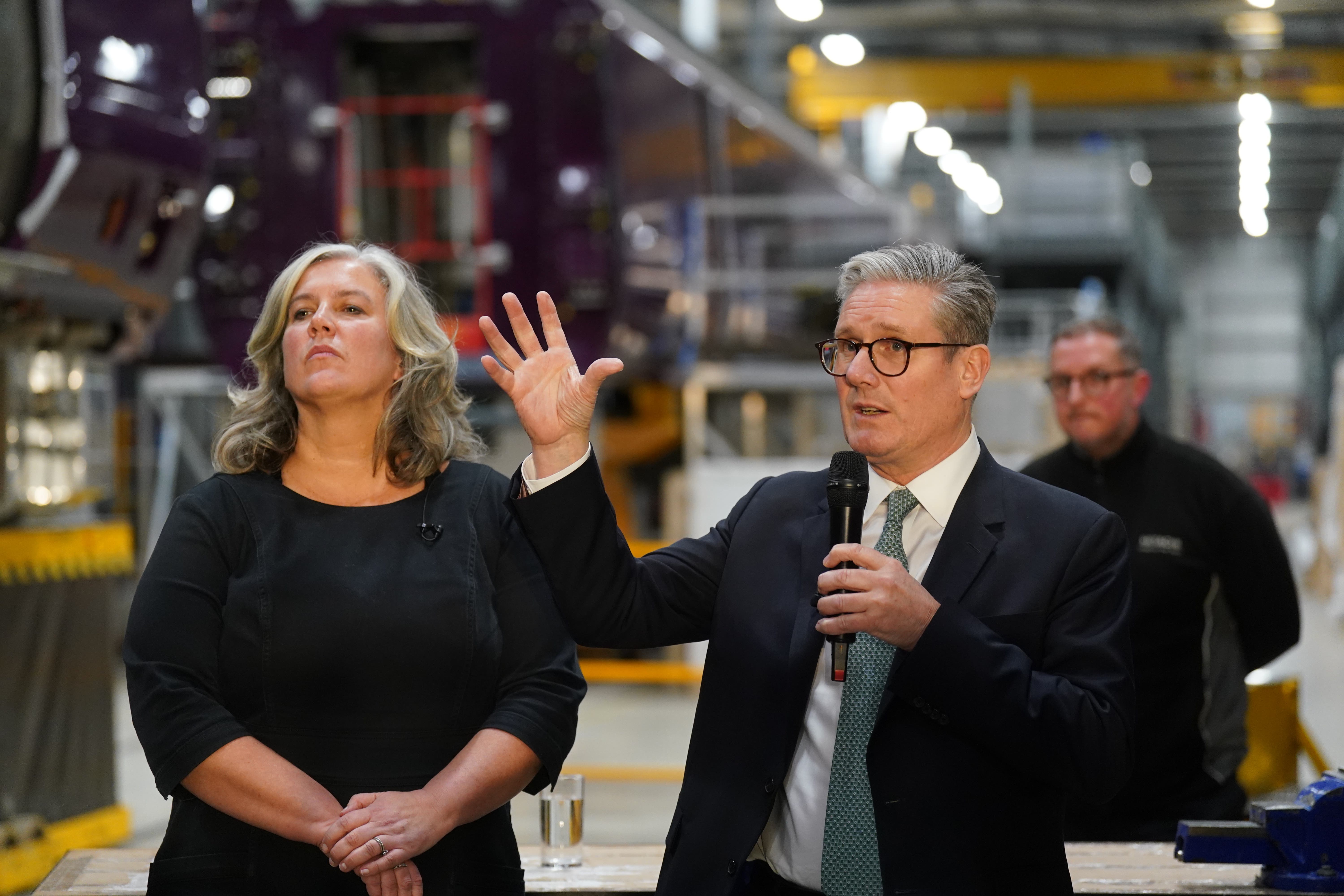 Transport Secretary Heidi Alexander (left) and Prime Minister Sir Keir Starmer during a visit to Hitachi in Newton Aycliffe (Owen Humphreys/PA)