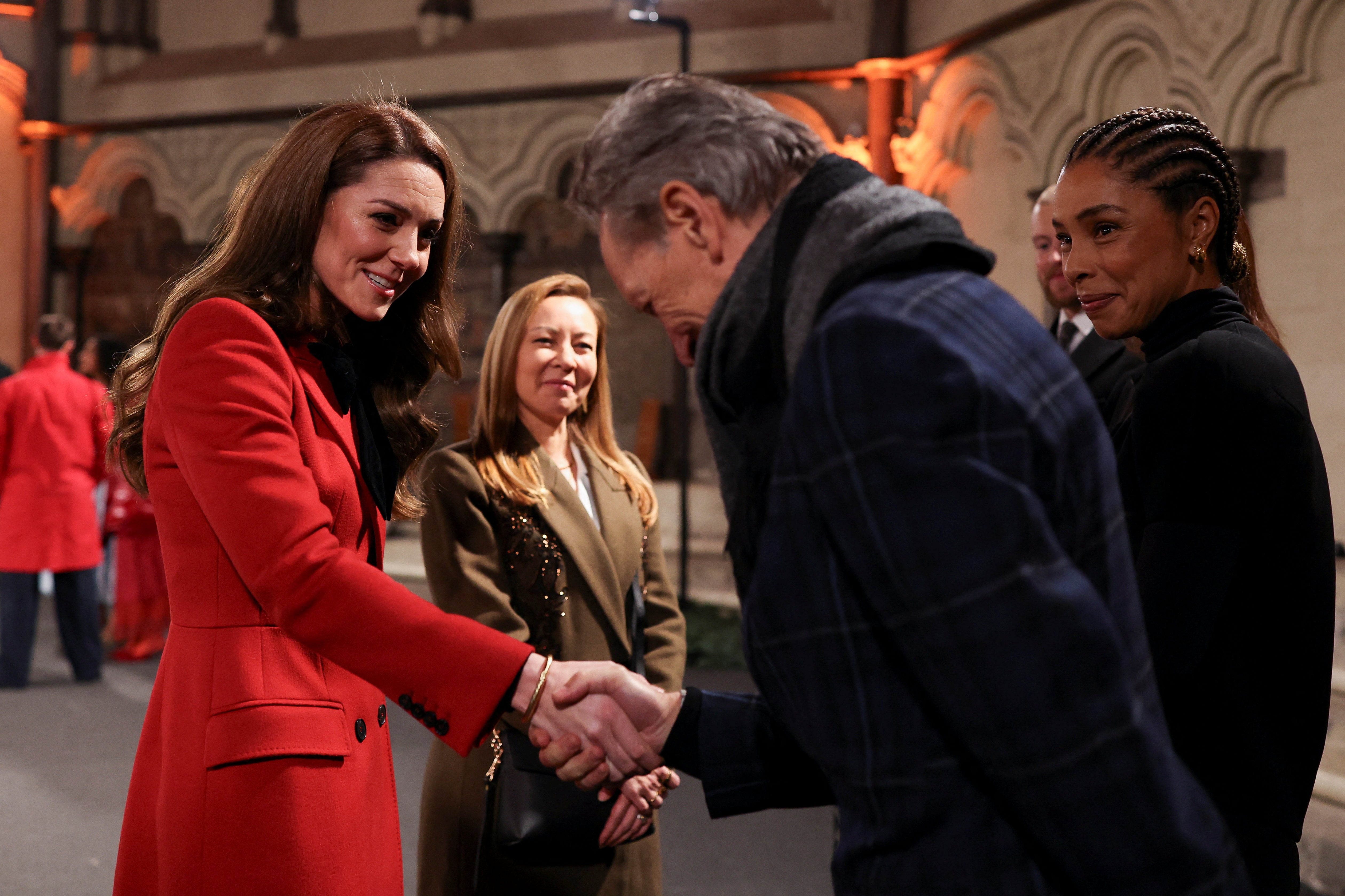 The Princess of Wales shakes hands with actor Richard E. Grant at Westminster Abbey