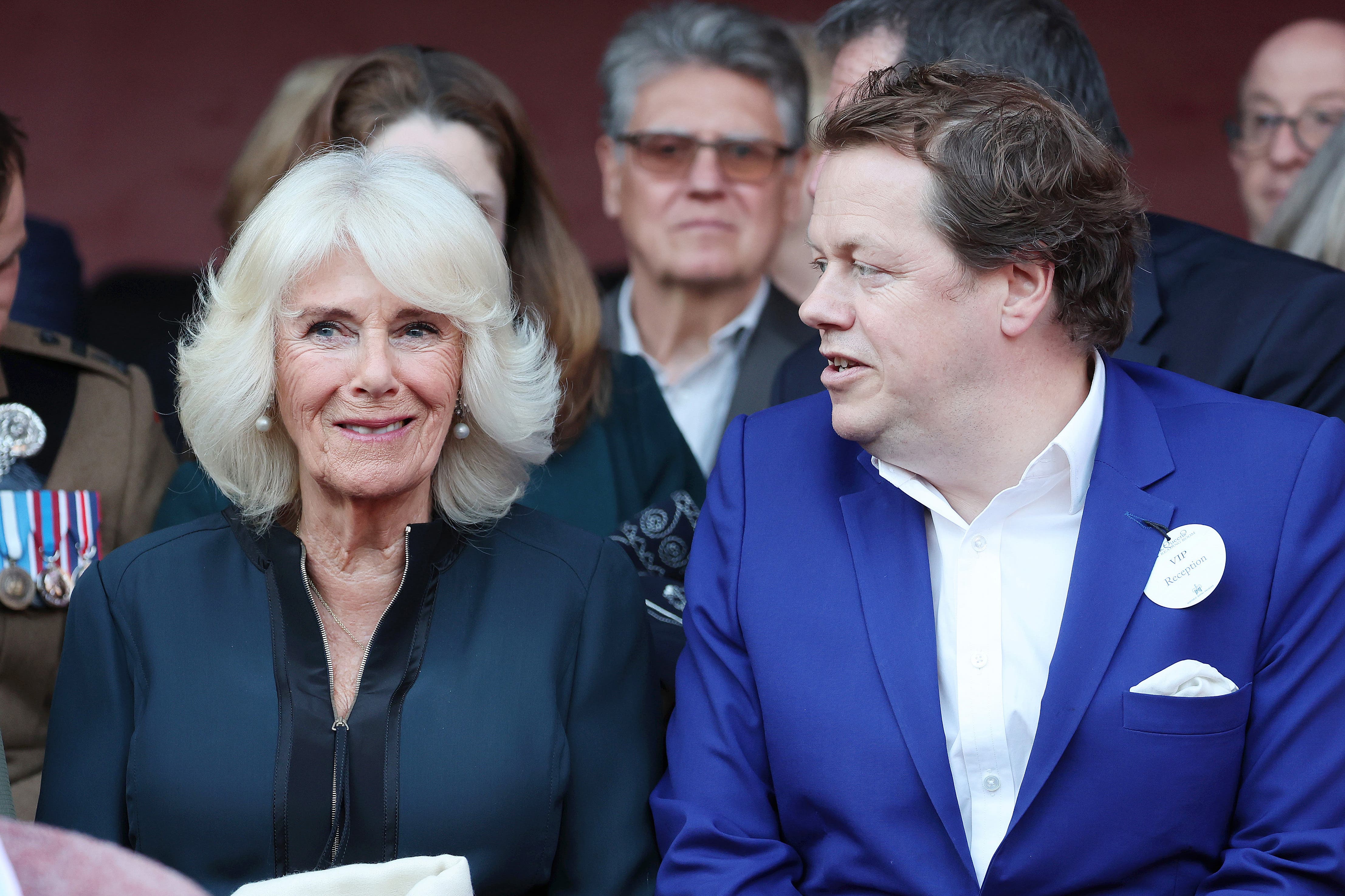 Queen Camilla and Tom Parker Bowles attending the Queen’s Reading Room Literary Festival at Hampton Court Palace. (PA)