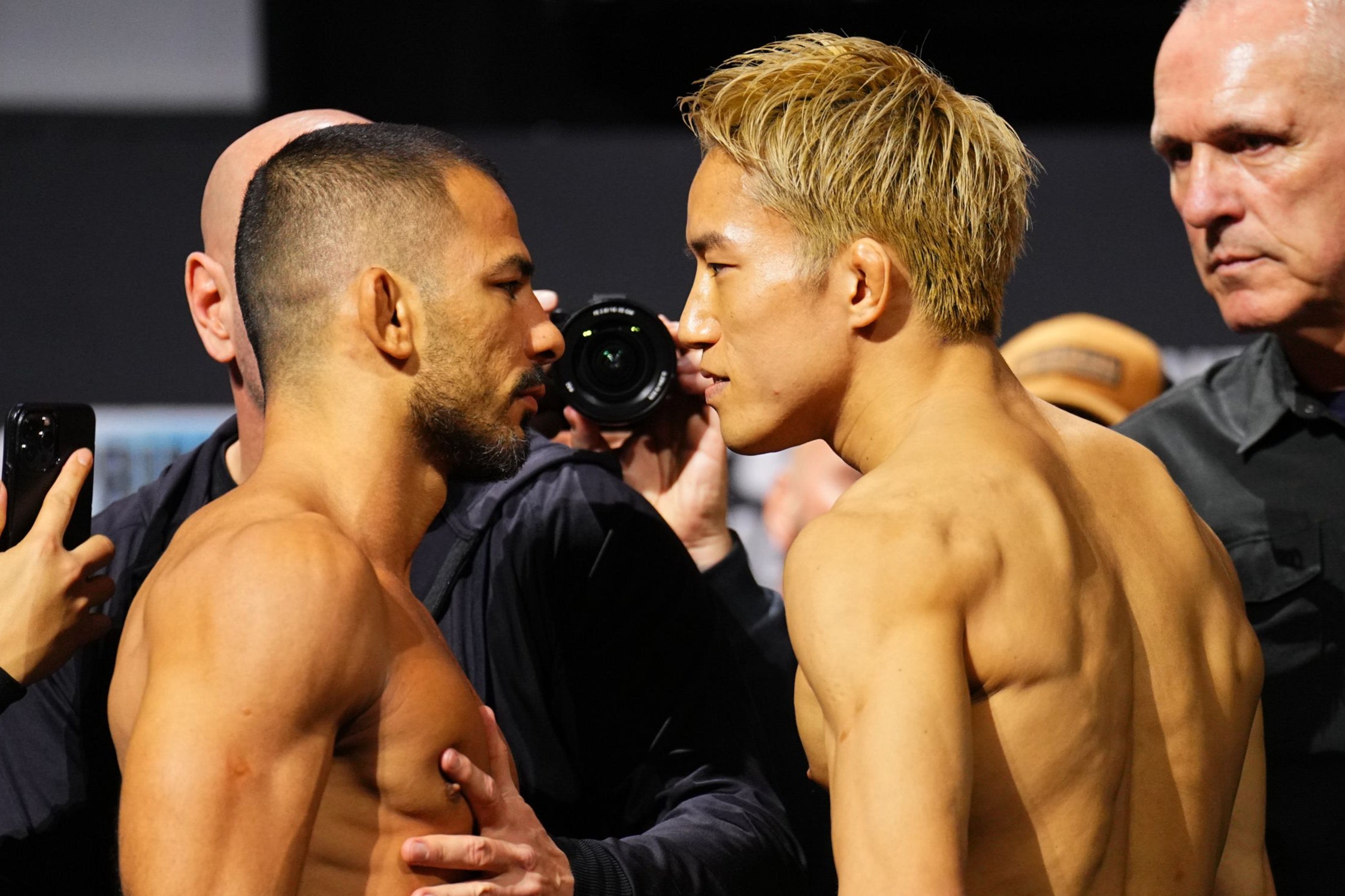 Flyweight champion Alexandre Pantoja (left) and challenger Kai Asakura