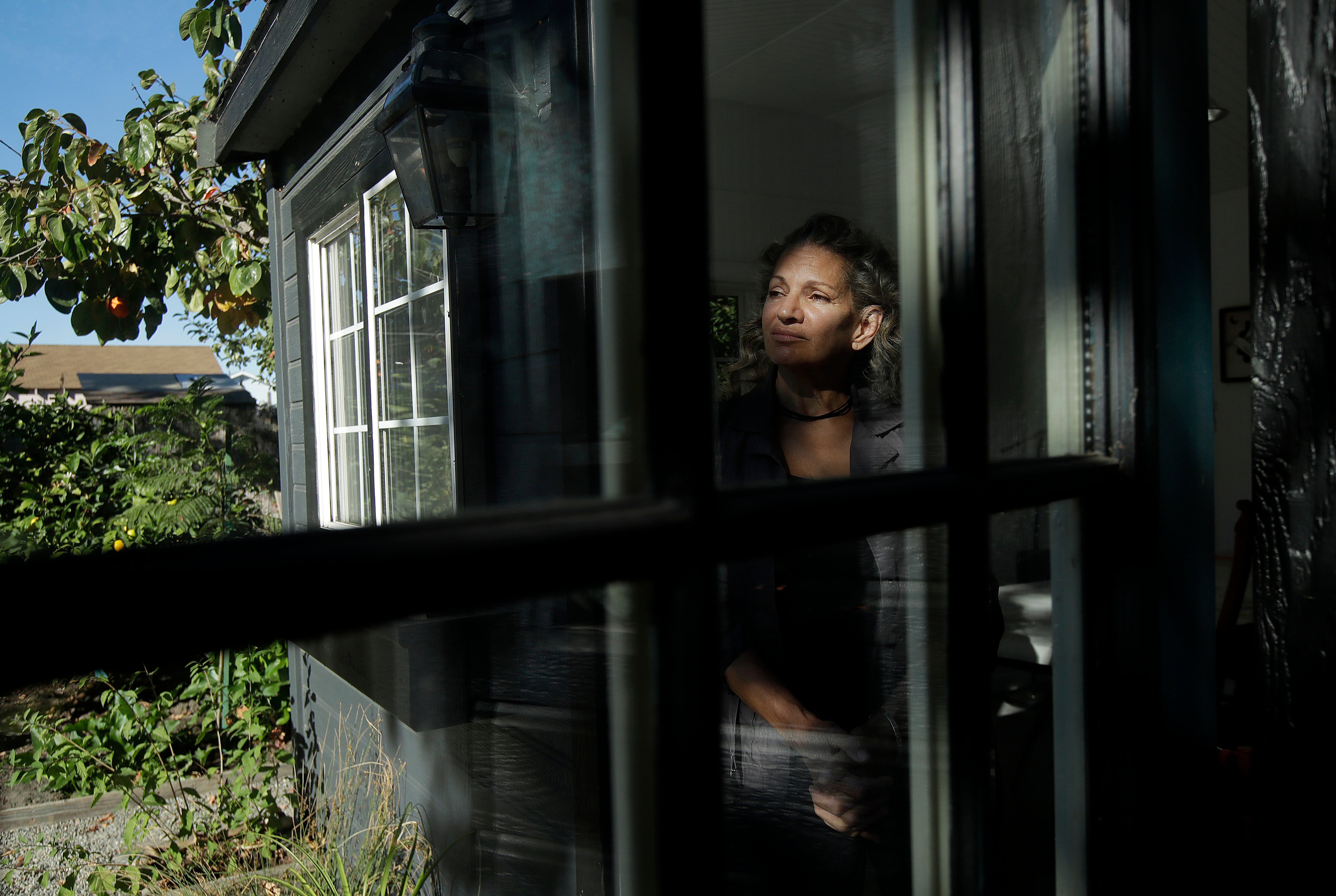 Jordan Vilchez, who grew up in California and was moved into the Peoples Temple Guyana commune at age 14, poses for a portrait in Richmond