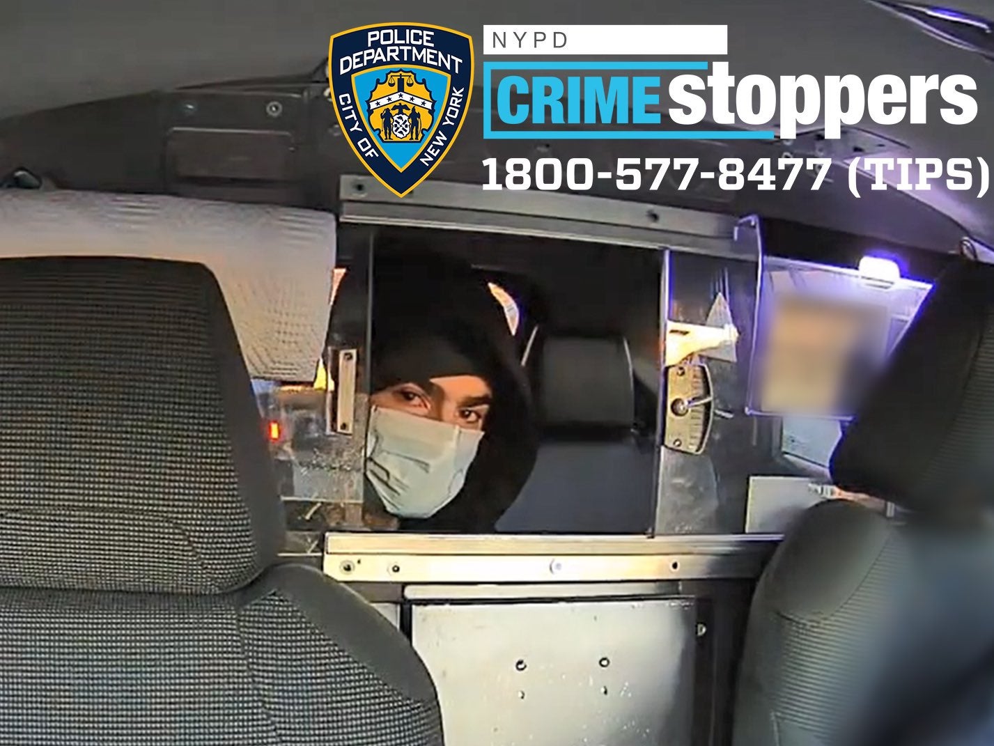 The man suspected of killing UnitedHealthcare CEO Brian Thompson seen in a cab in a new photo from the NYPD